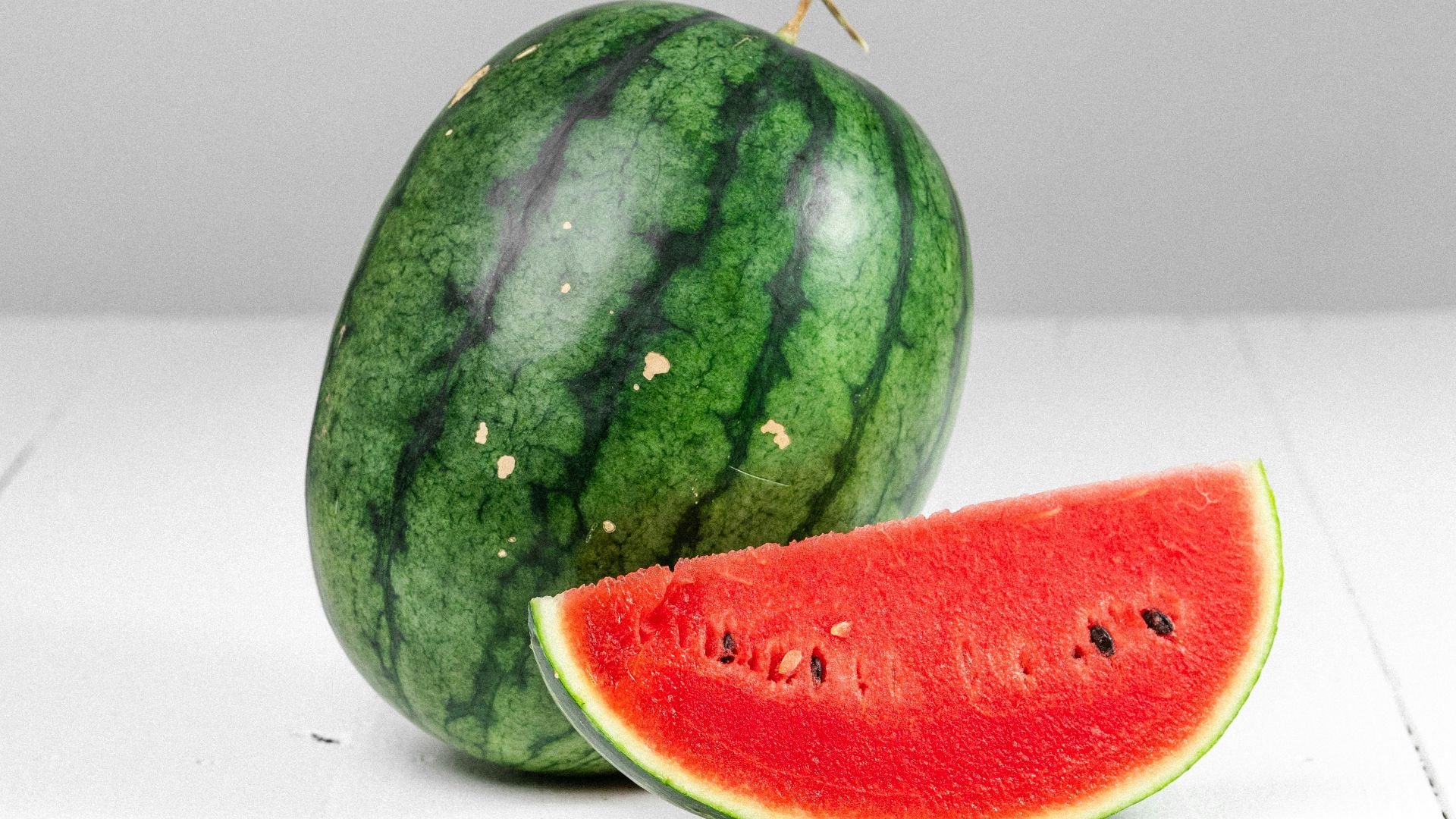 watermelon fruit on white table