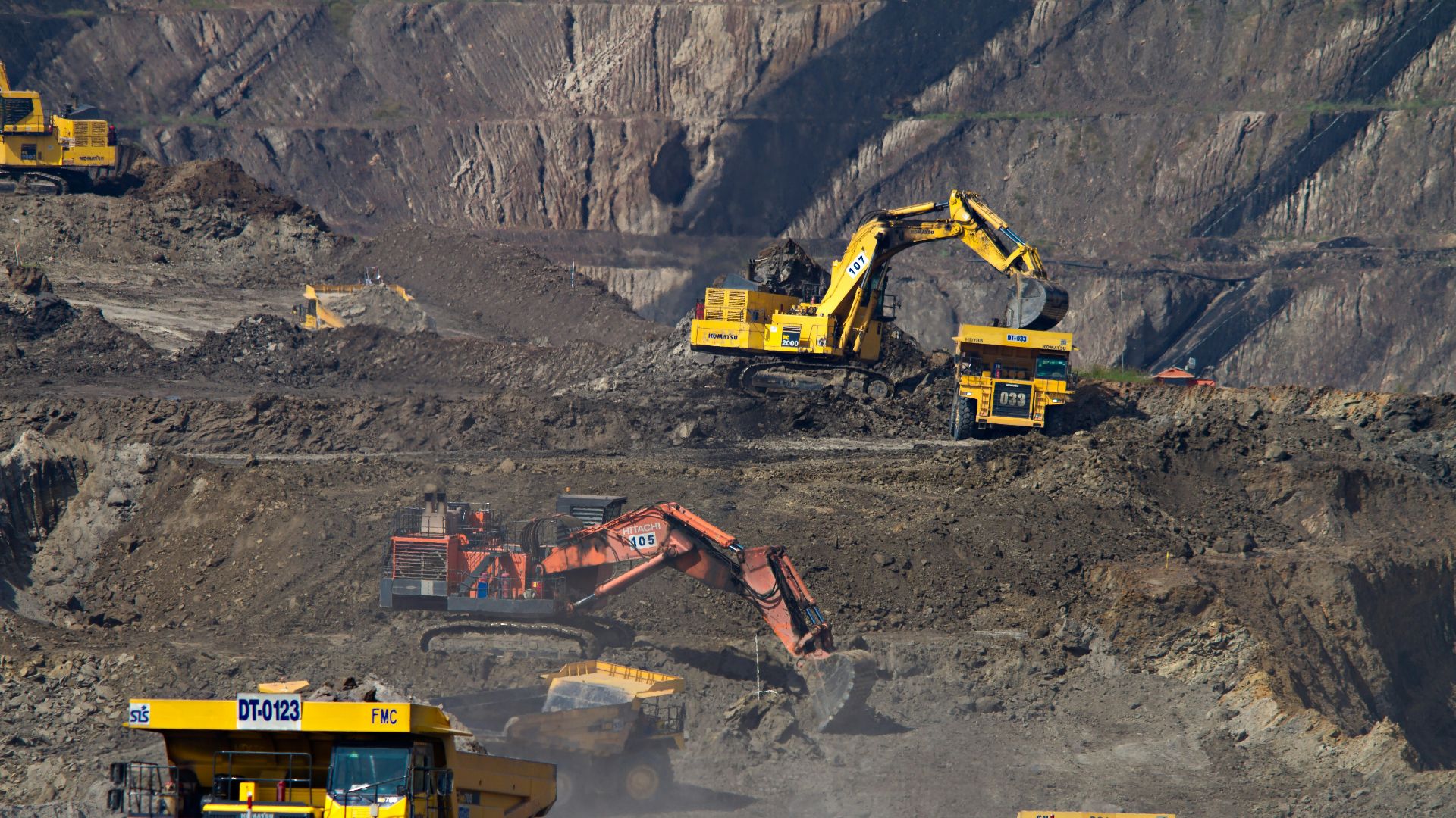photography of excavators at mining area