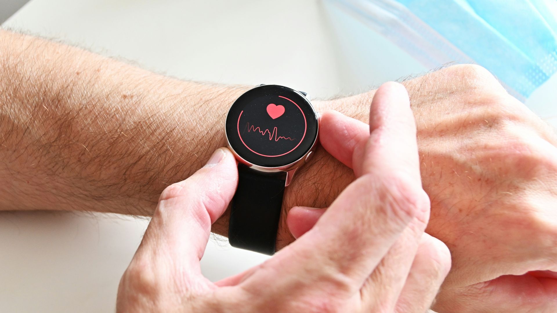 a person holding a stopwatch