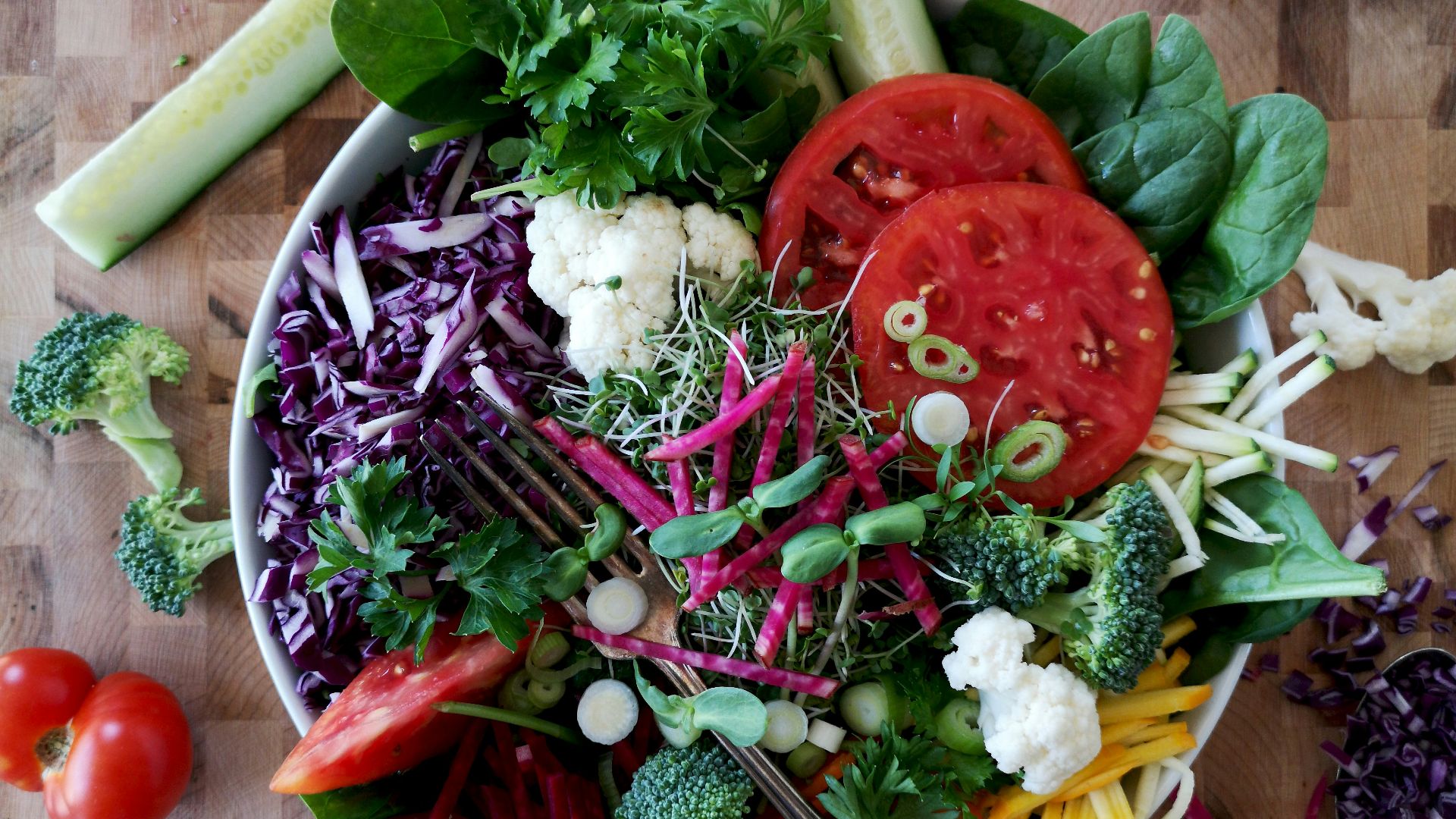 vegetable salad on white ceramic bowl