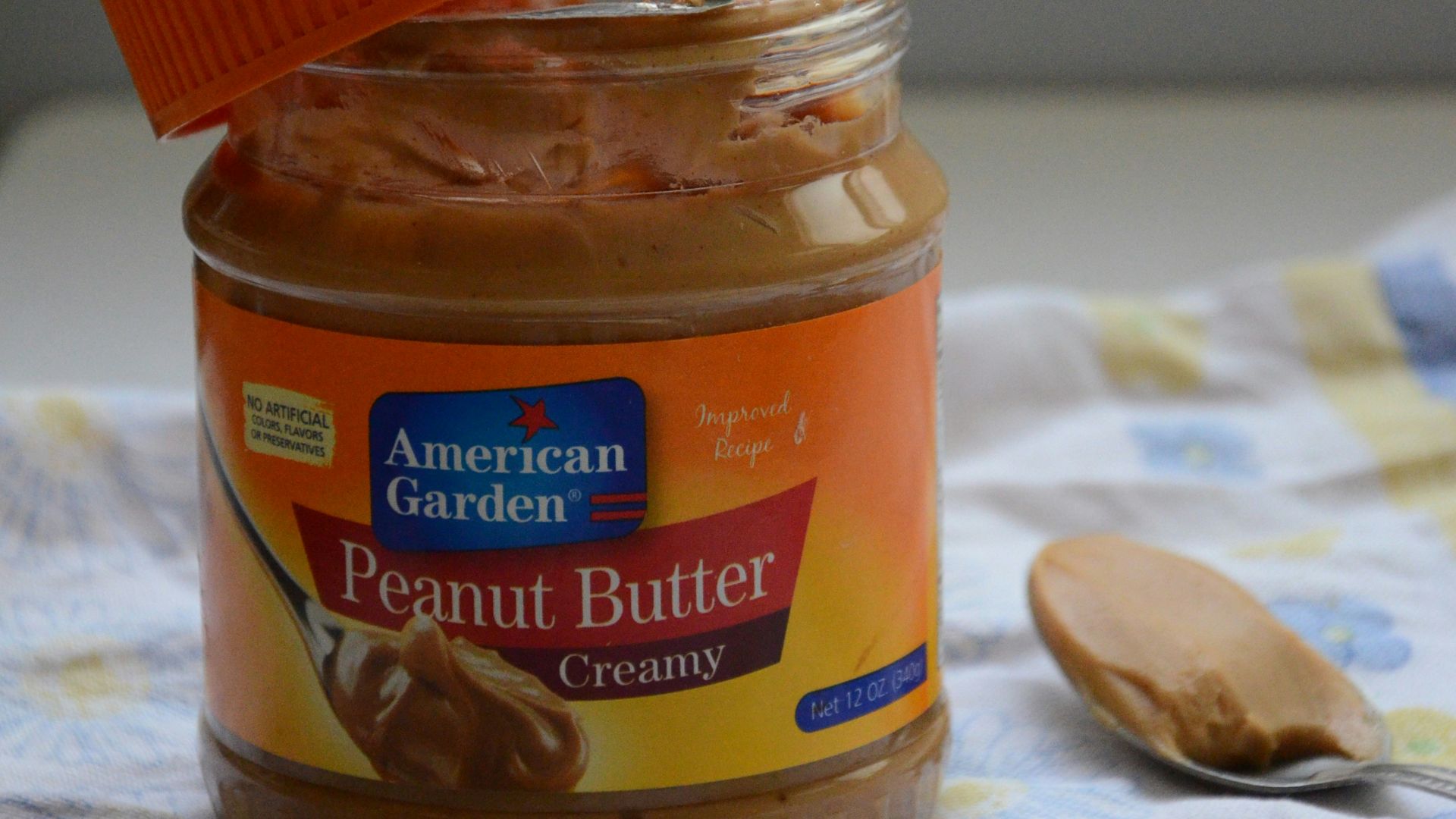 orange and blue labeled jar