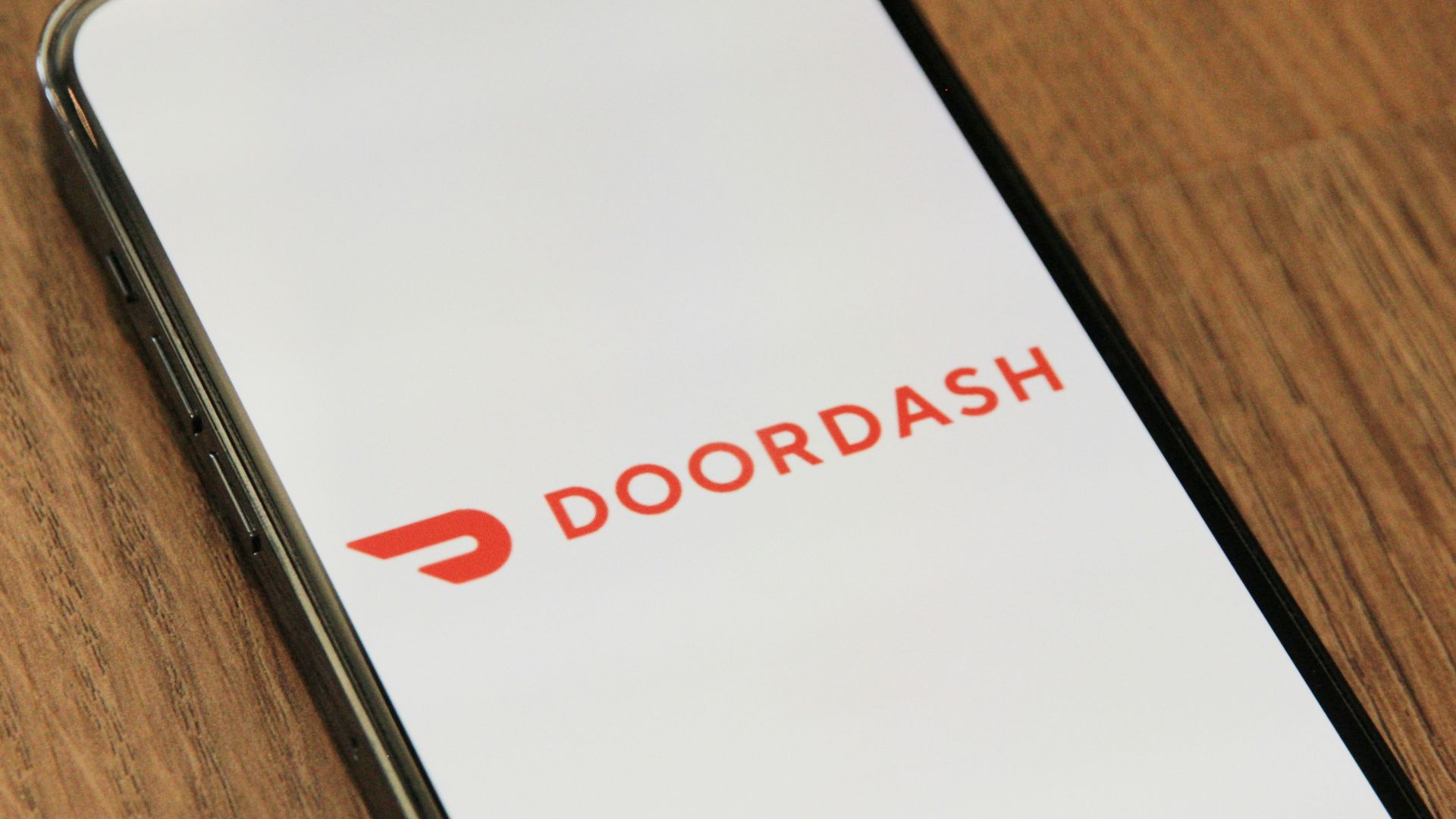 a close up of a cell phone on a table