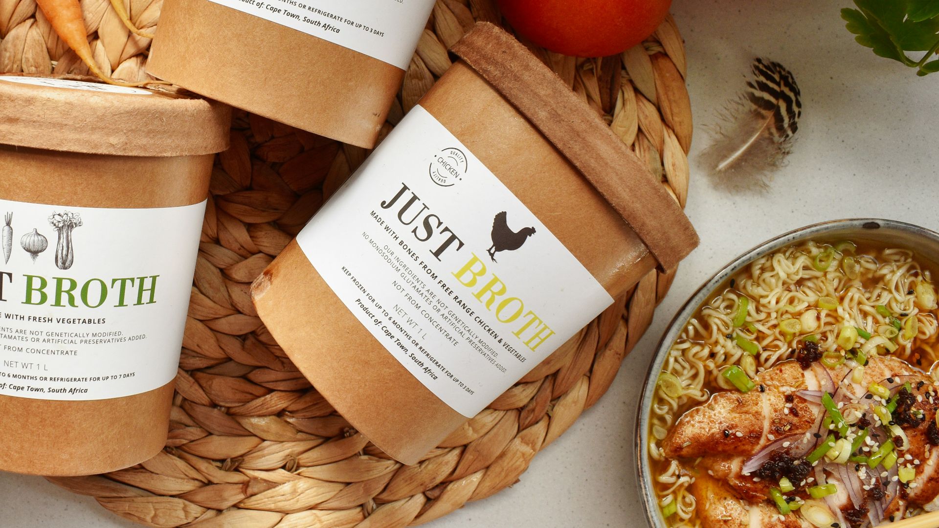 a table topped with bowls of food and bowls of vegetables
