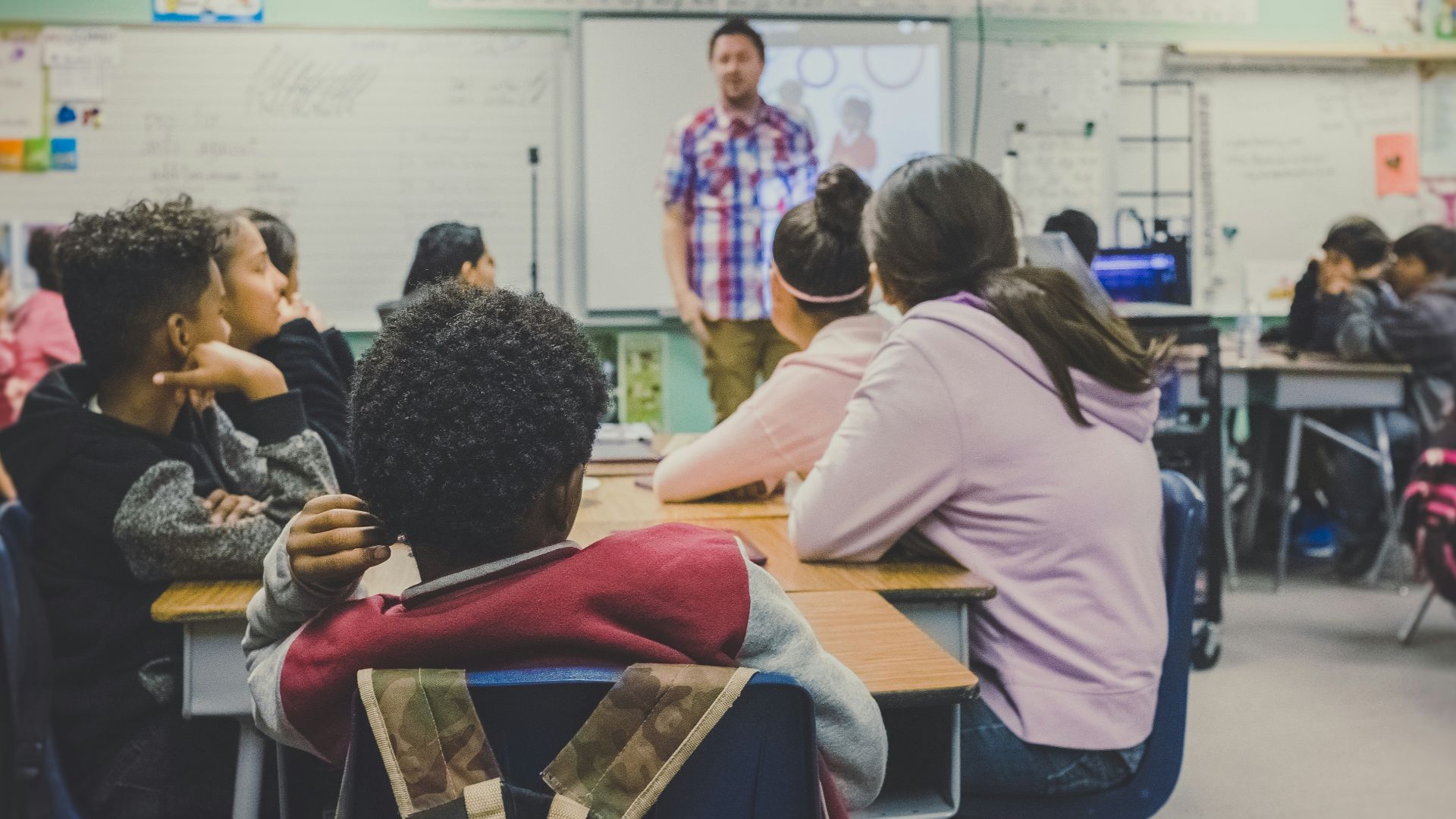 man and woman sitting on chairs