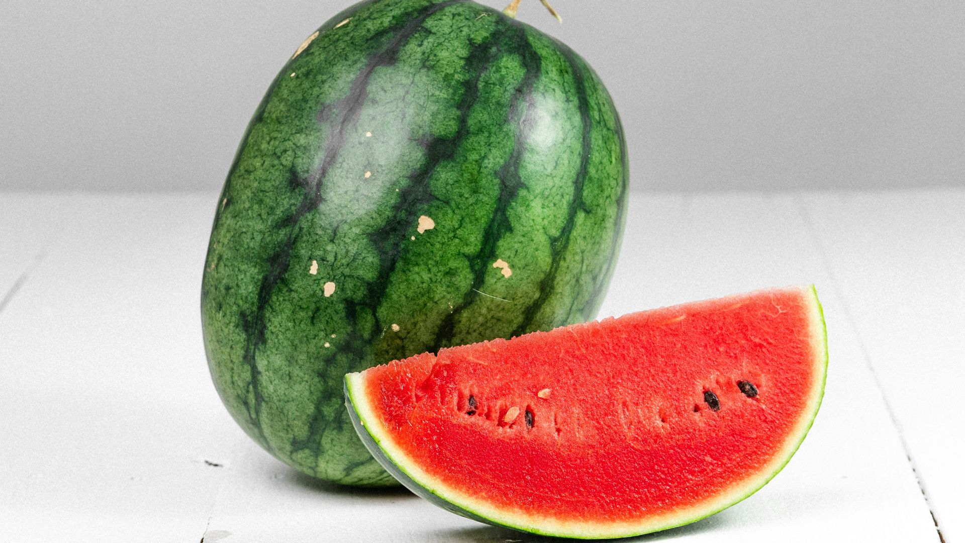 watermelon fruit on white table