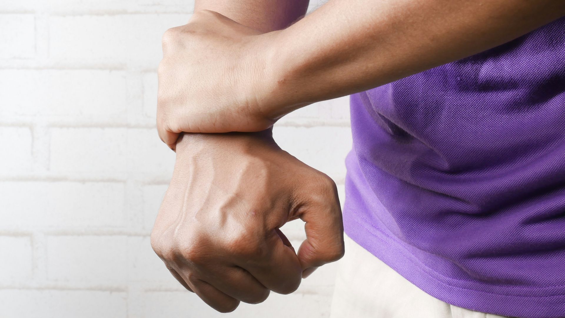 person holding hands of another person