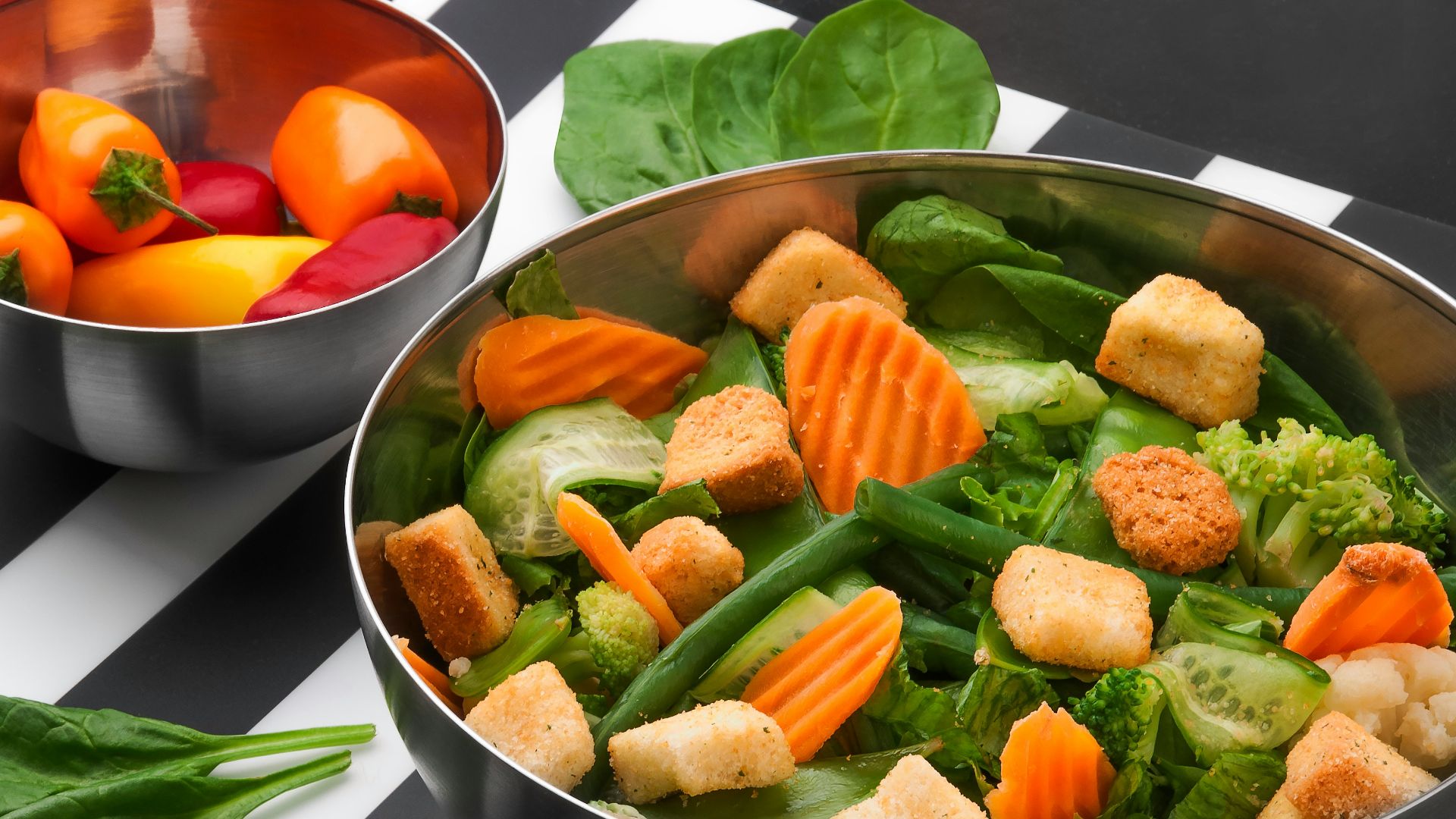 sliced vegetables on stainless steel bowl