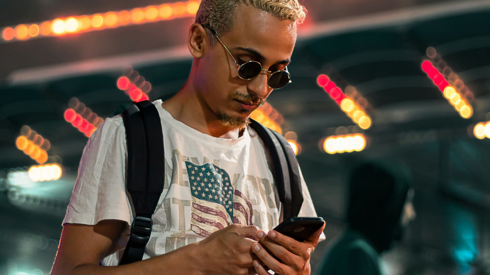 man wearing white crew-neck T-shirt