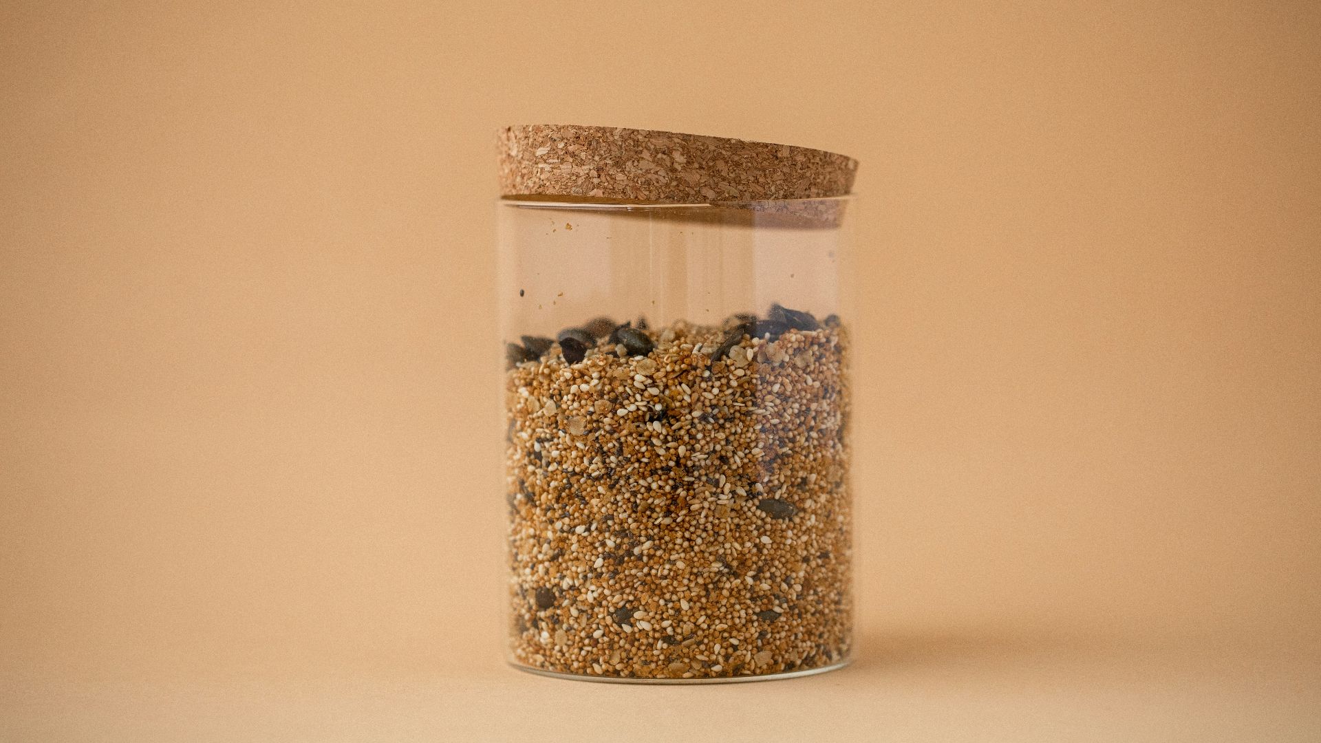 a jar filled with lots of different types of food