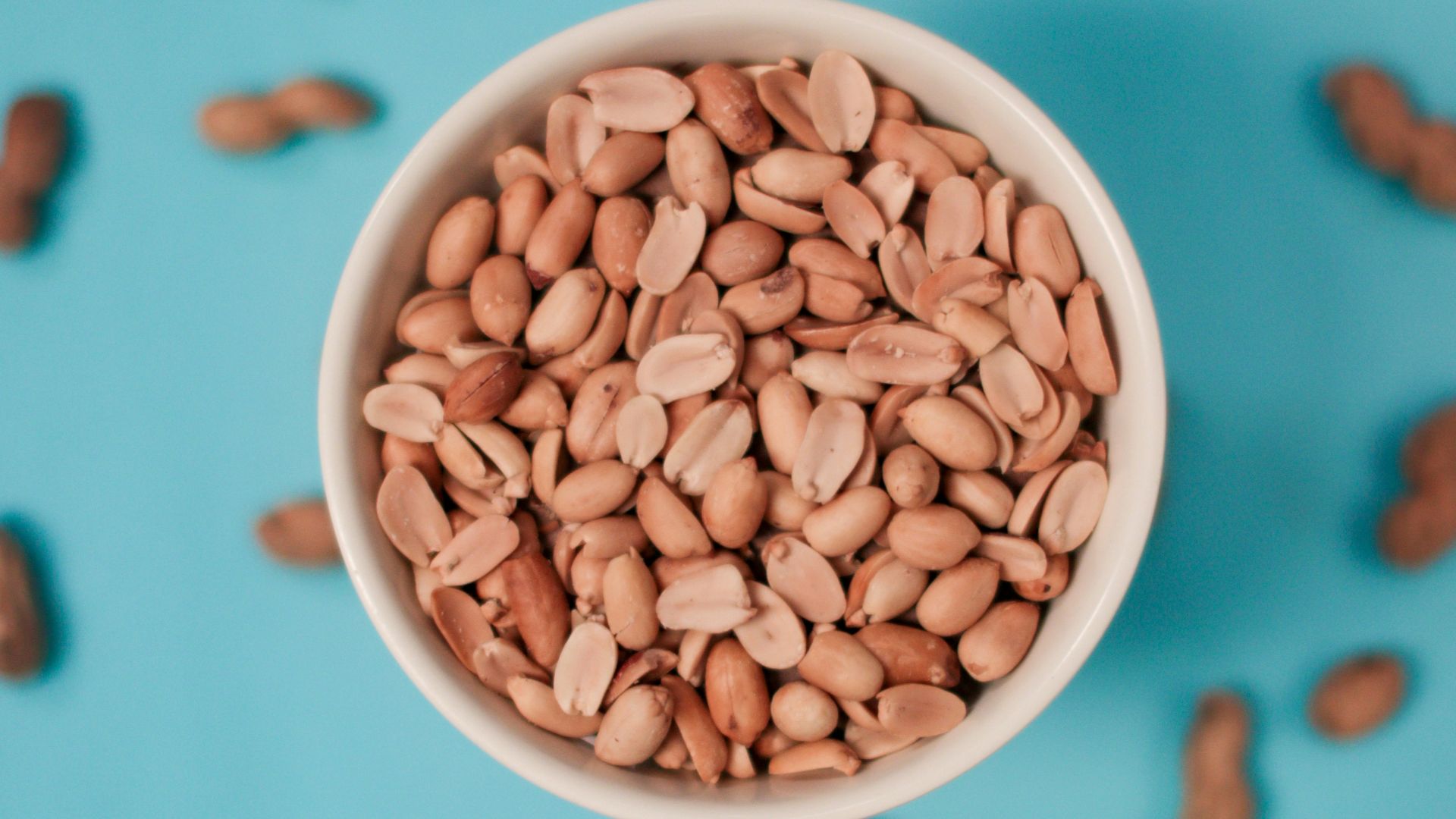 brown beans in white ceramic bowl