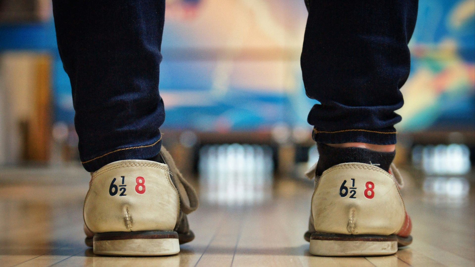 person standing on bowling court