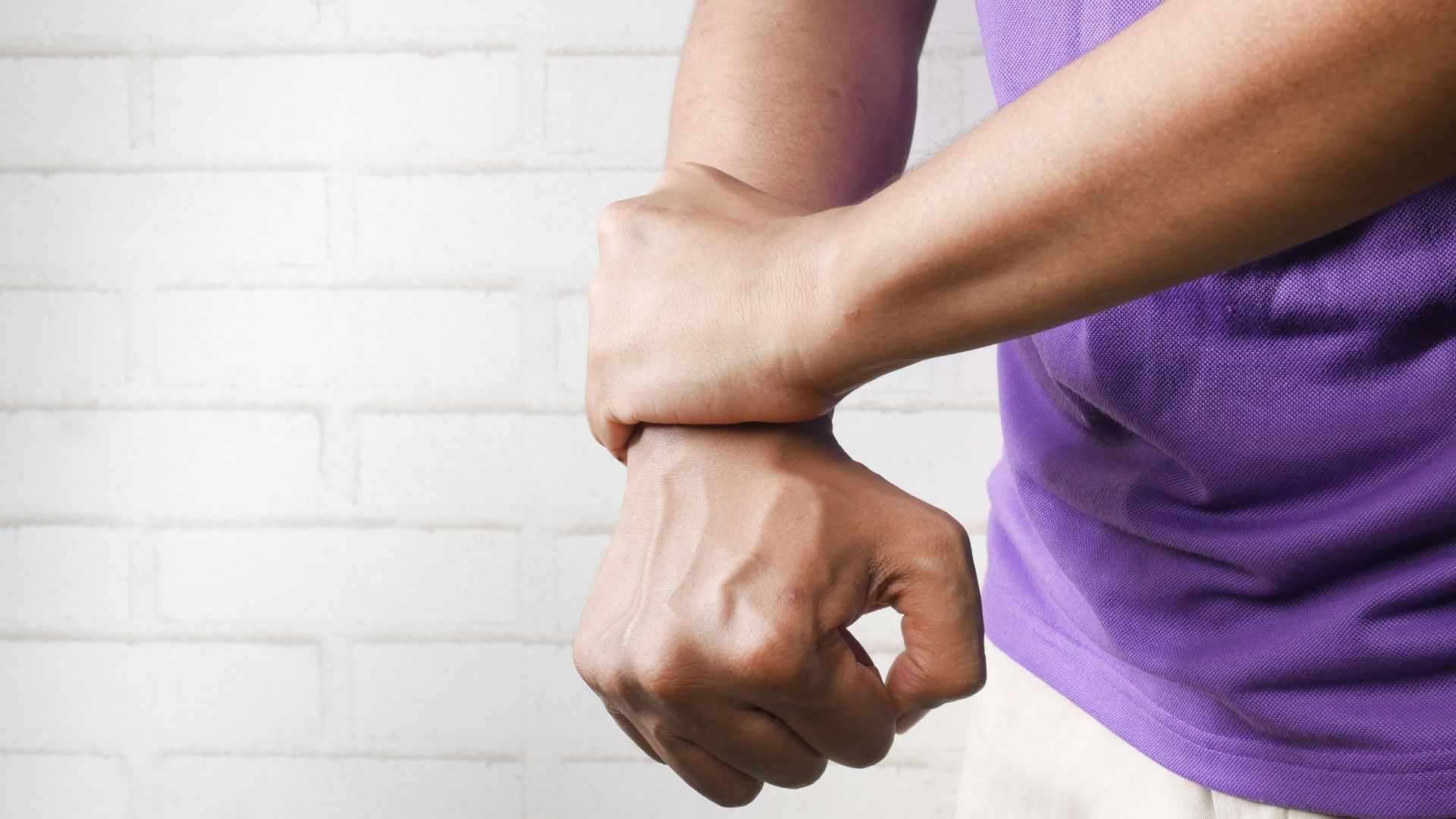 person holding hands of another person