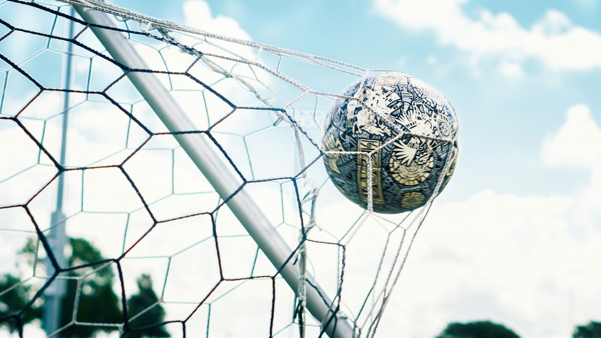 white and black ball on white metal frame