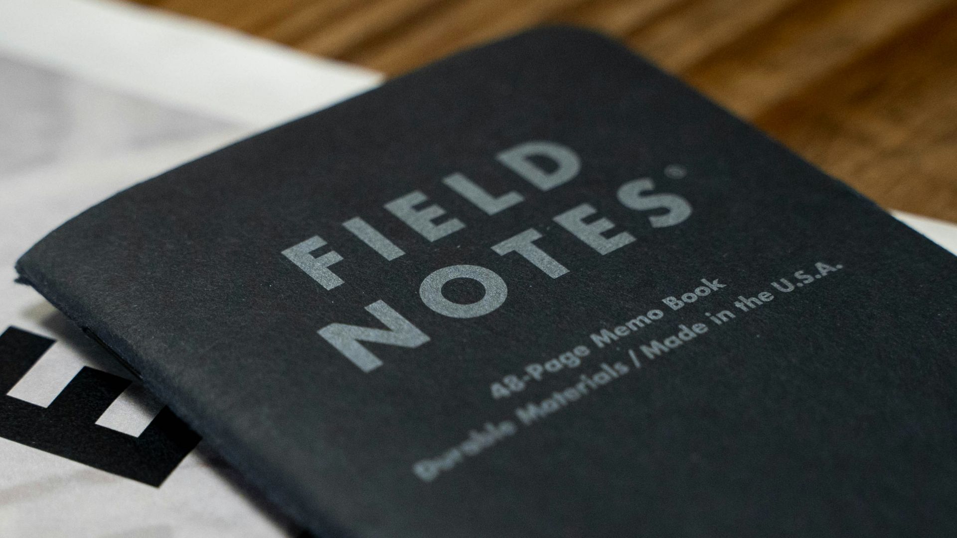 a book with a pen sitting on top of it