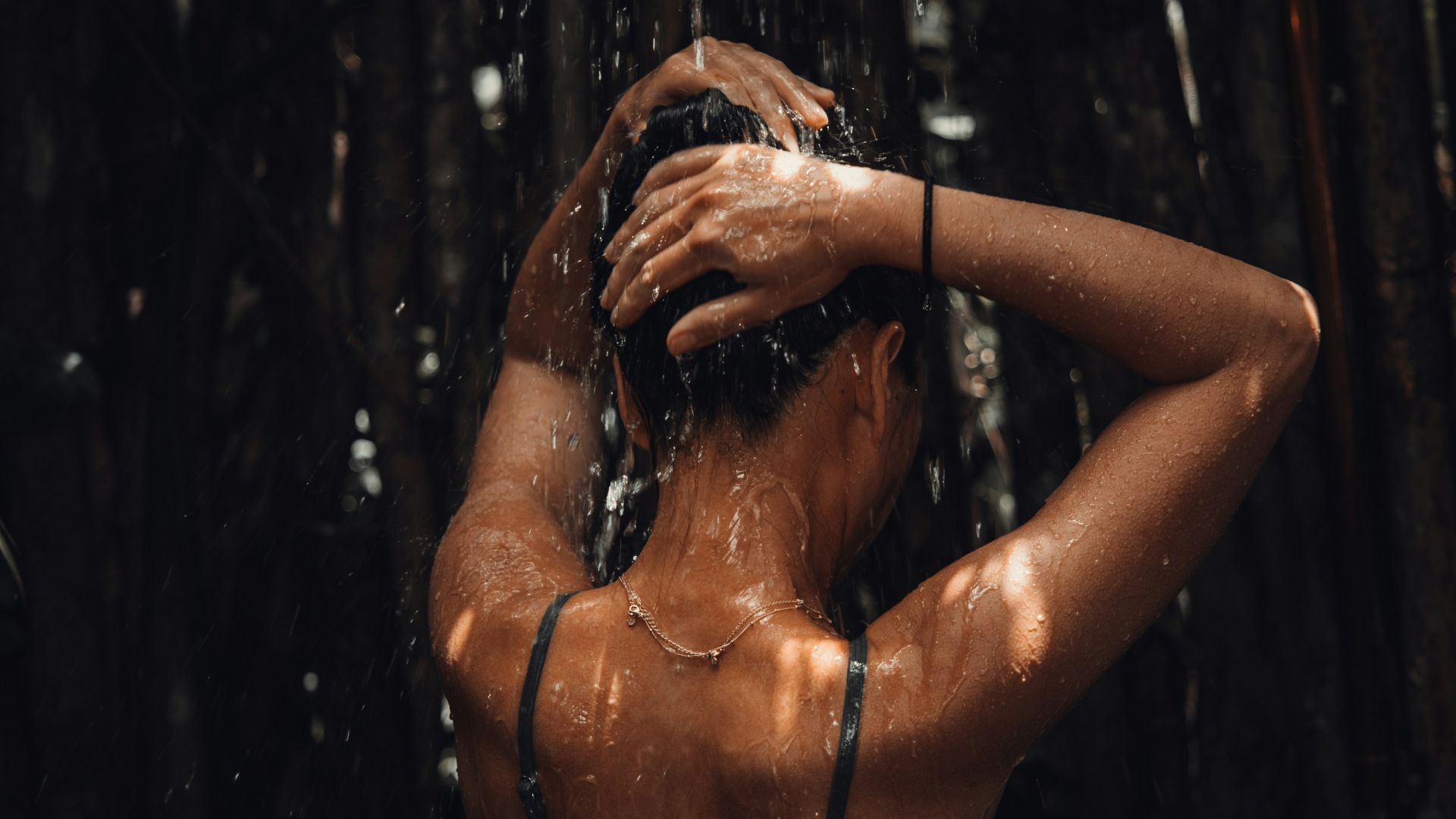 topless woman in black and white floral skirt