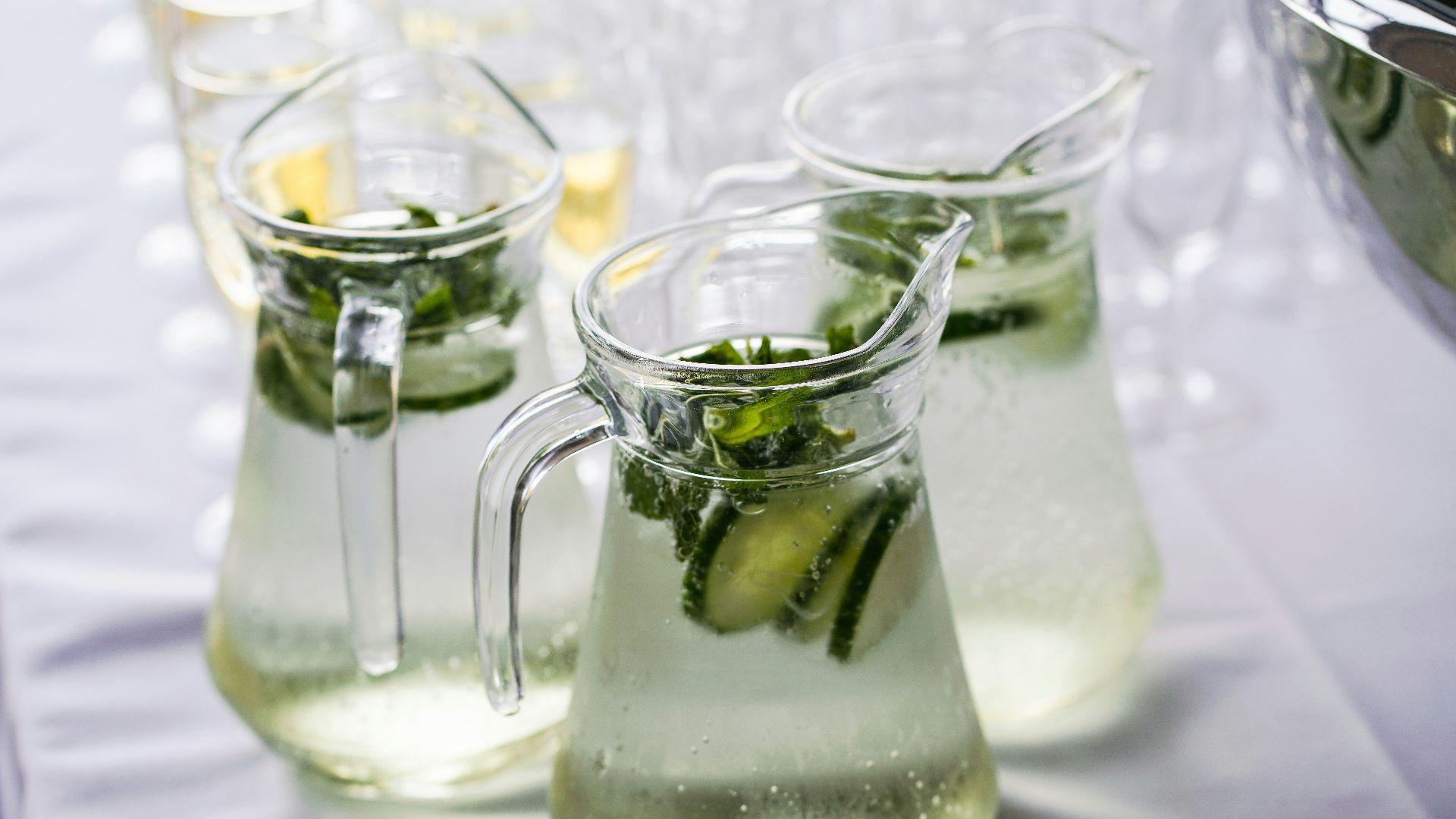 clear glass pitcher with content