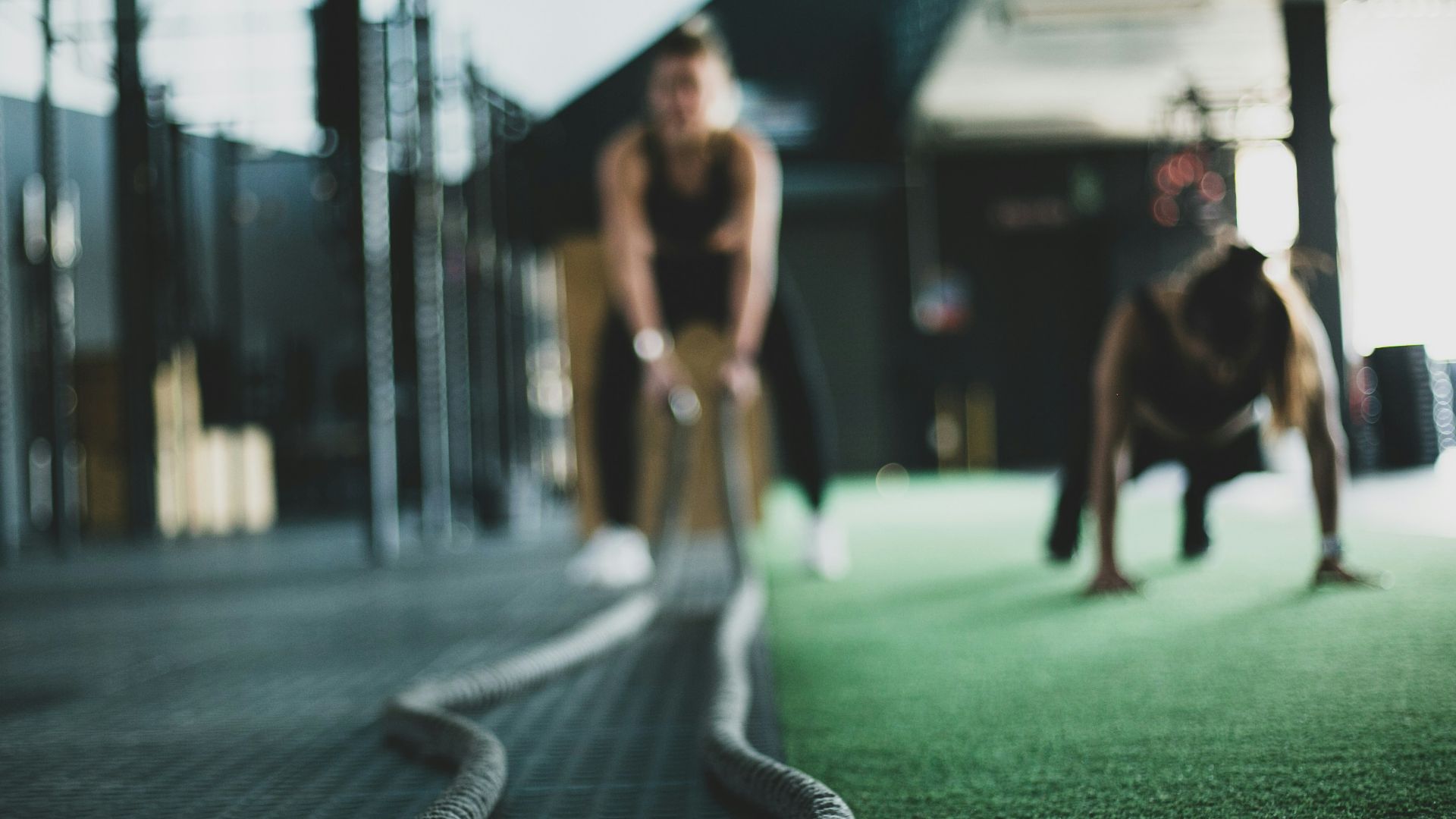 two person inside gym exercising
