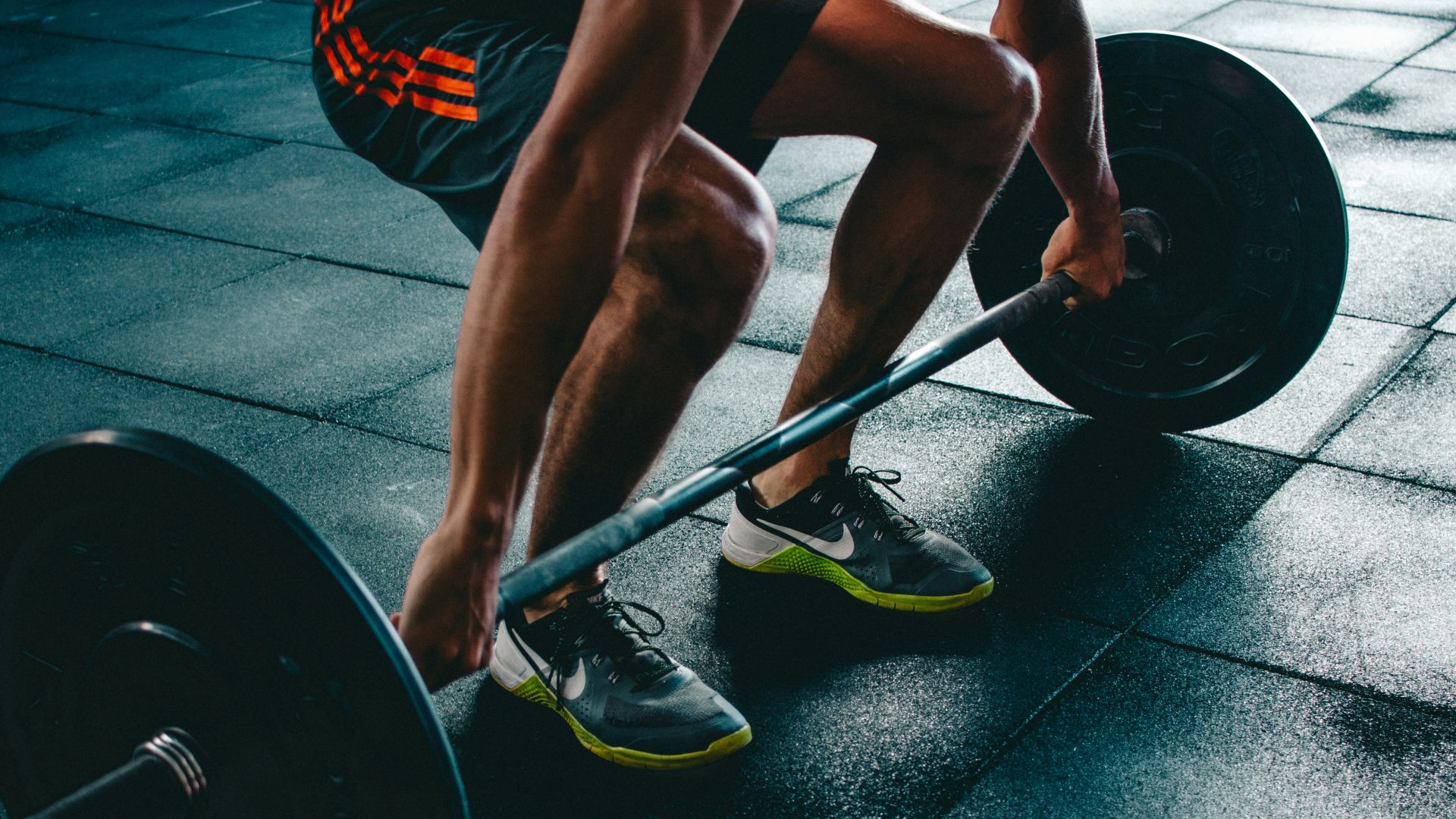 person about to lift the barbel