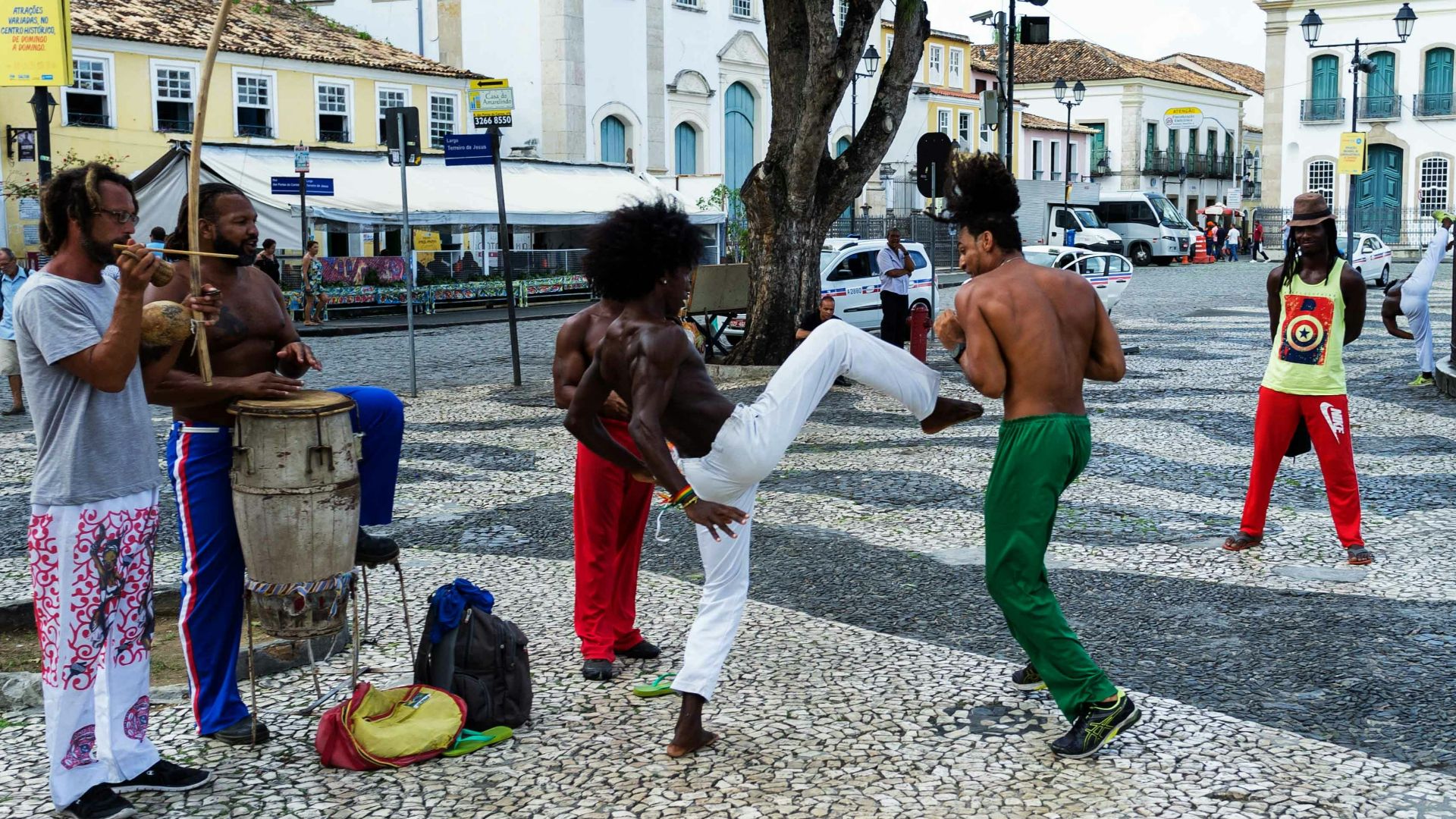 a group of people that are standing in the street