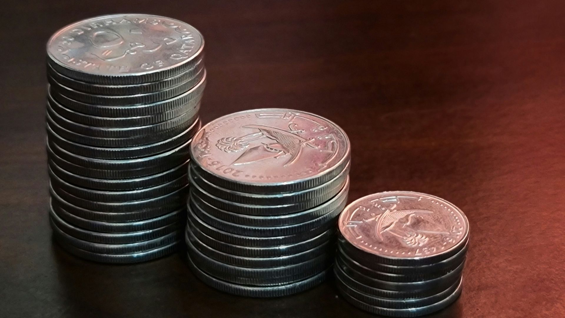 silver round can on brown wooden table