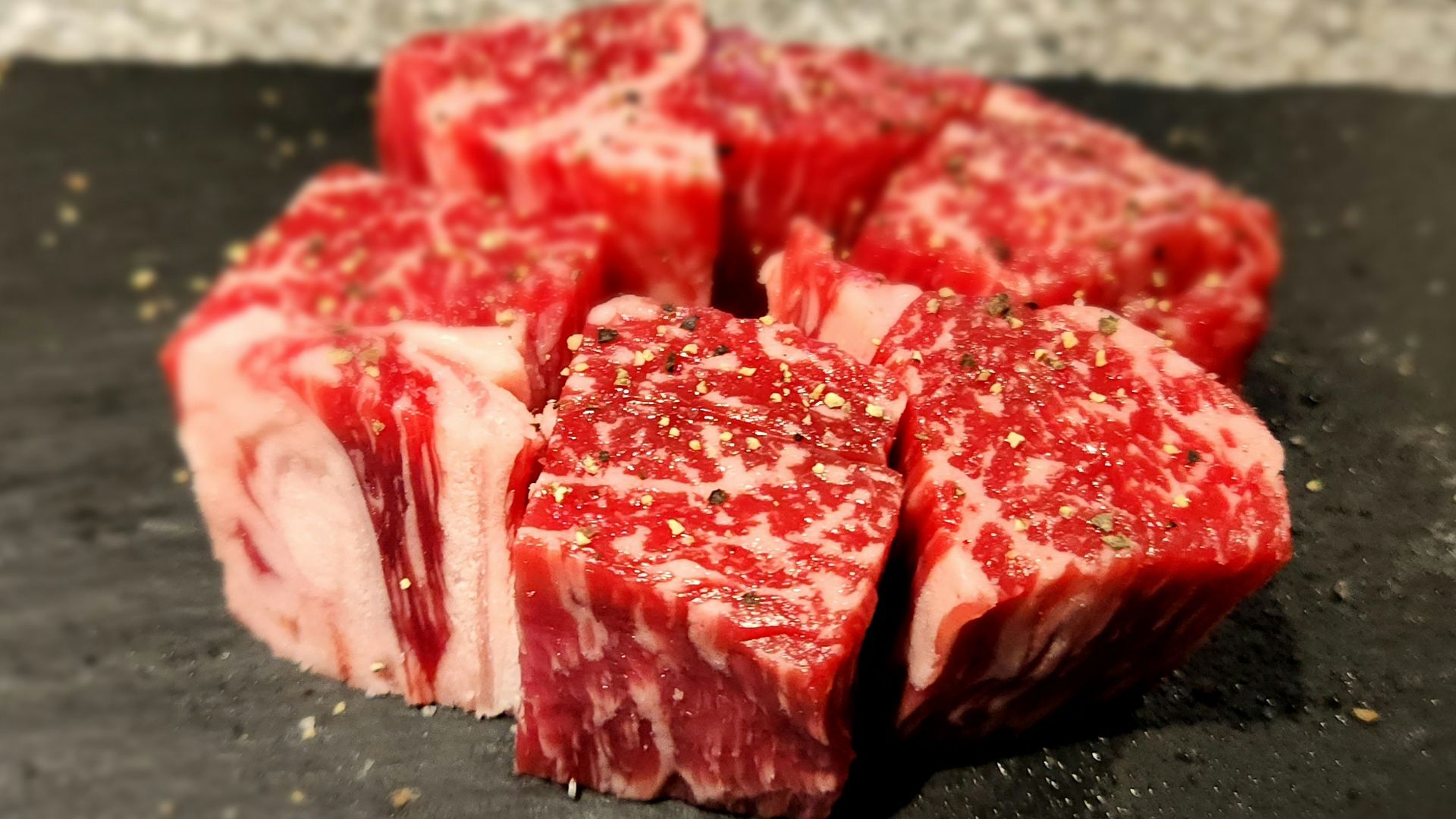a piece of raw meat on a cutting board