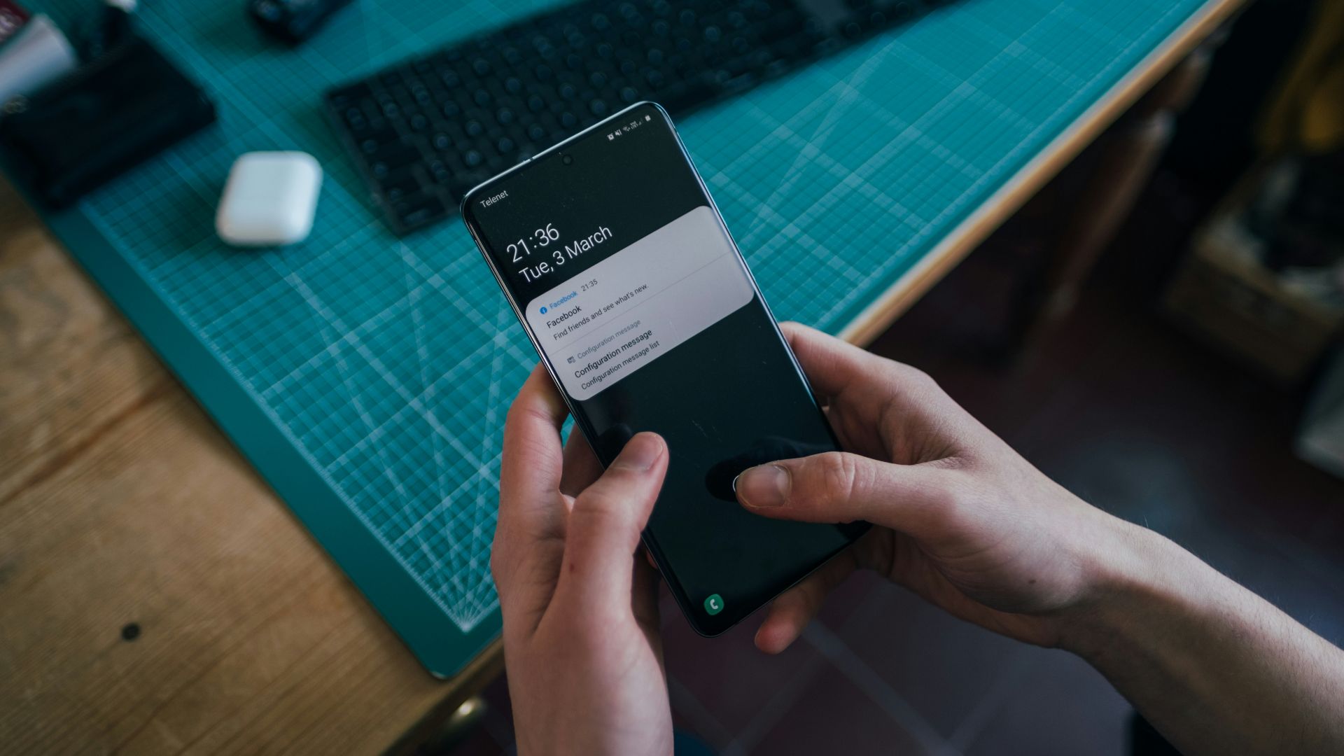 person holding black android smartphone