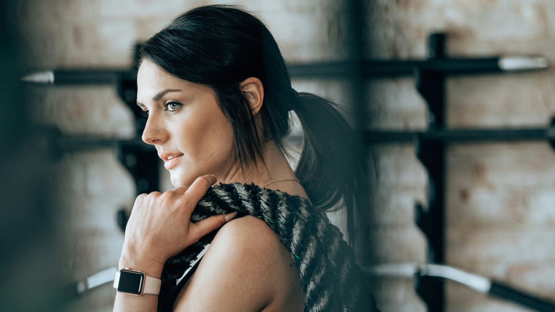 woman holding black rope