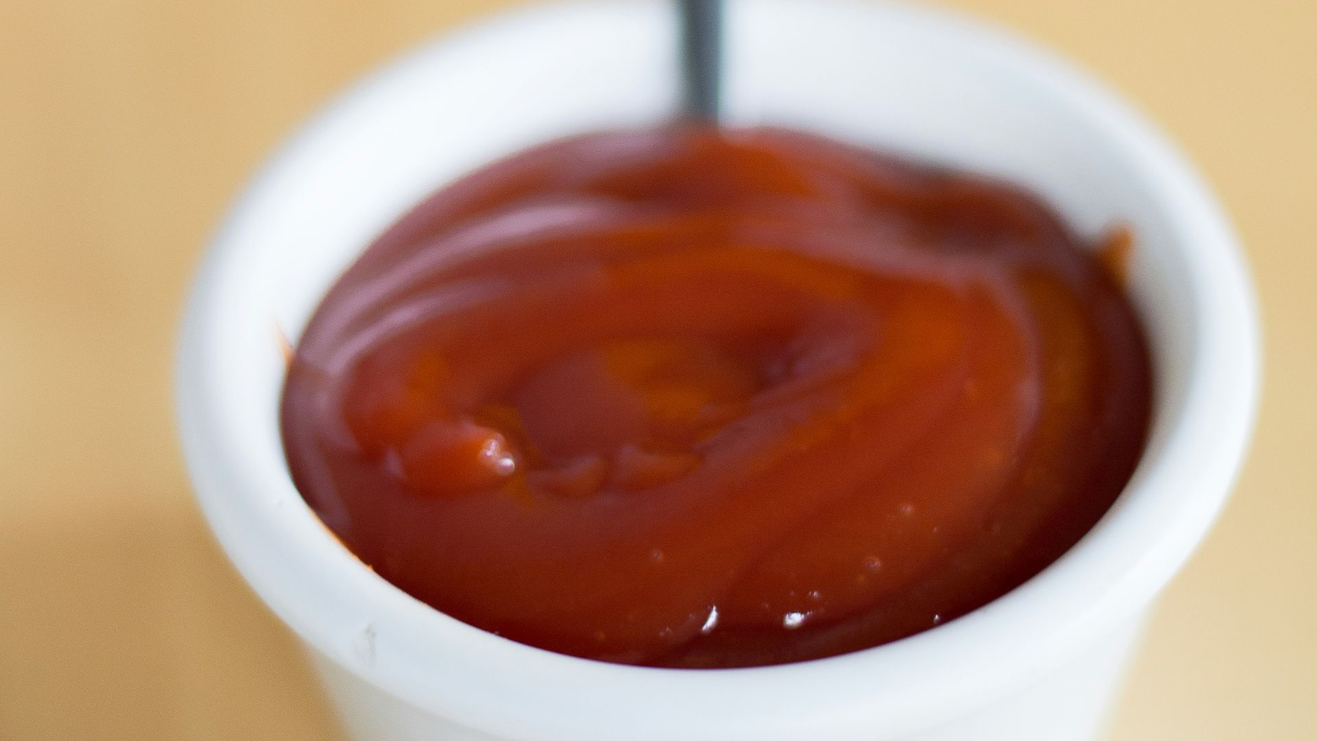 white ceramic mug with brown liquid
