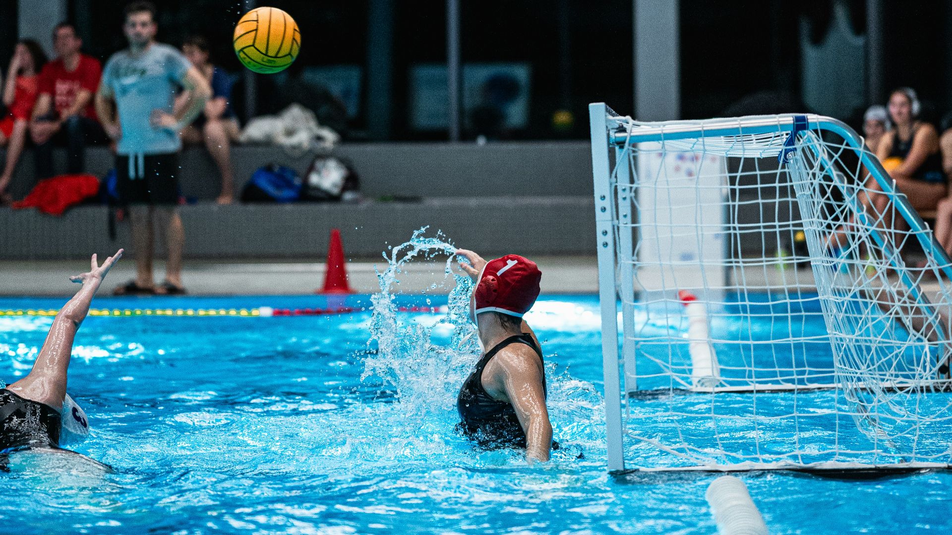 a group of people playing a game of water polo
