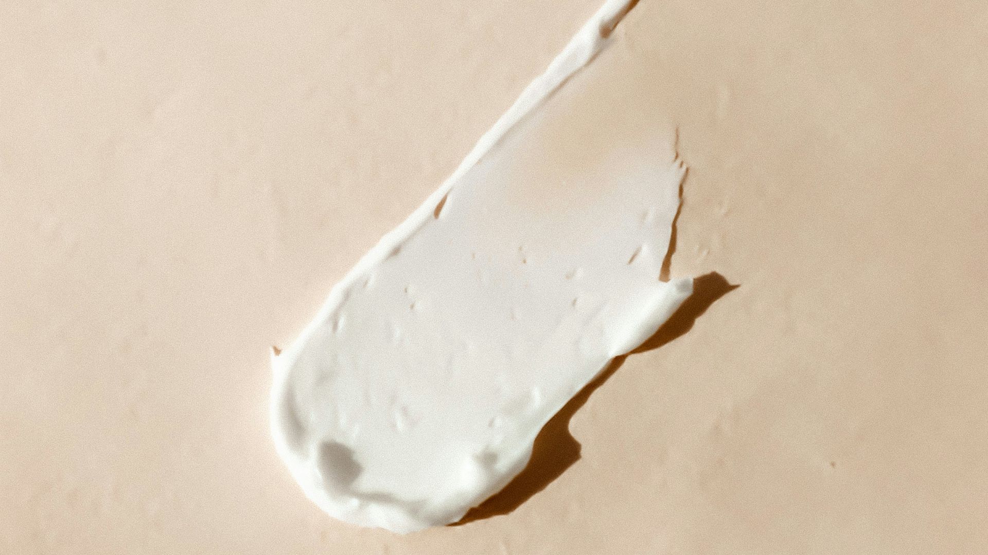 white cotton buds on white surface