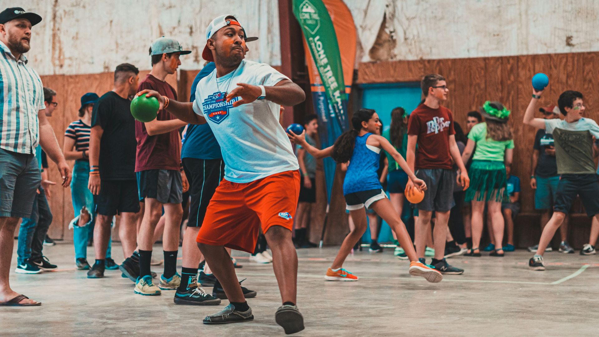 a group of people playing a game of tennis