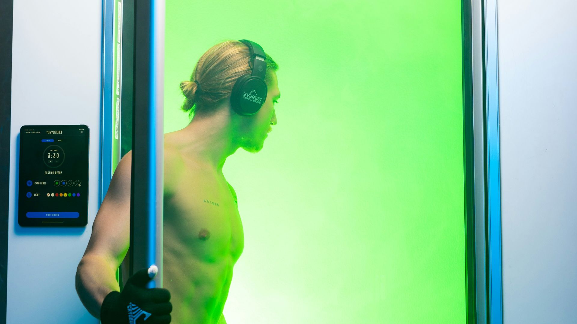 woman in yellow tank top holding microphone