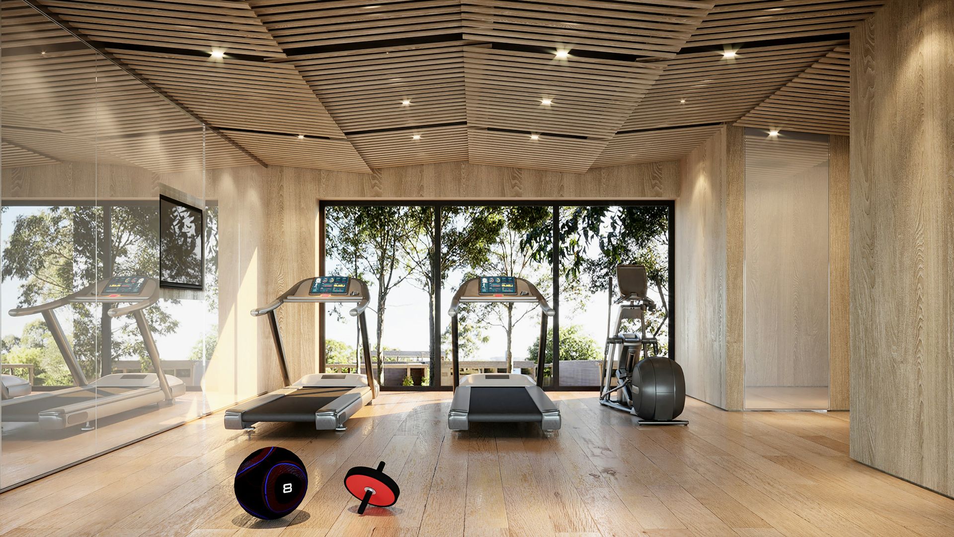 Modern gym with treadmills and large windows.
