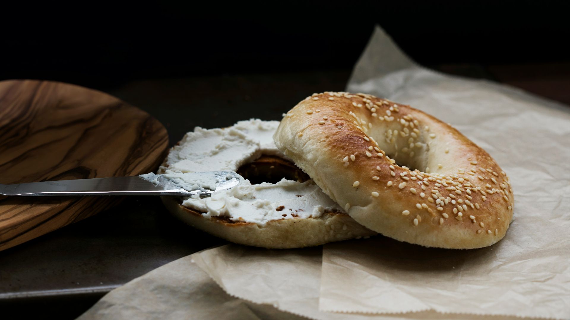 a bagel with a bite taken out of it