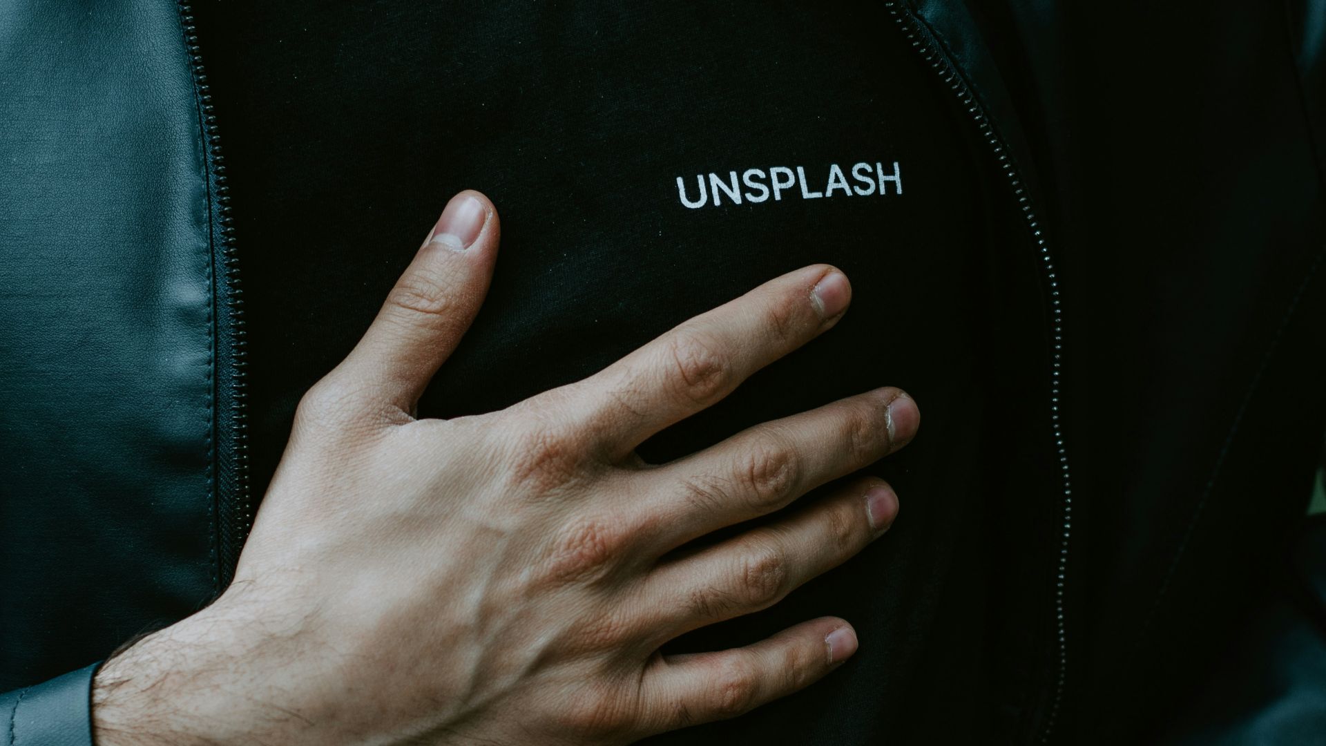 man in black adidas zip up jacket