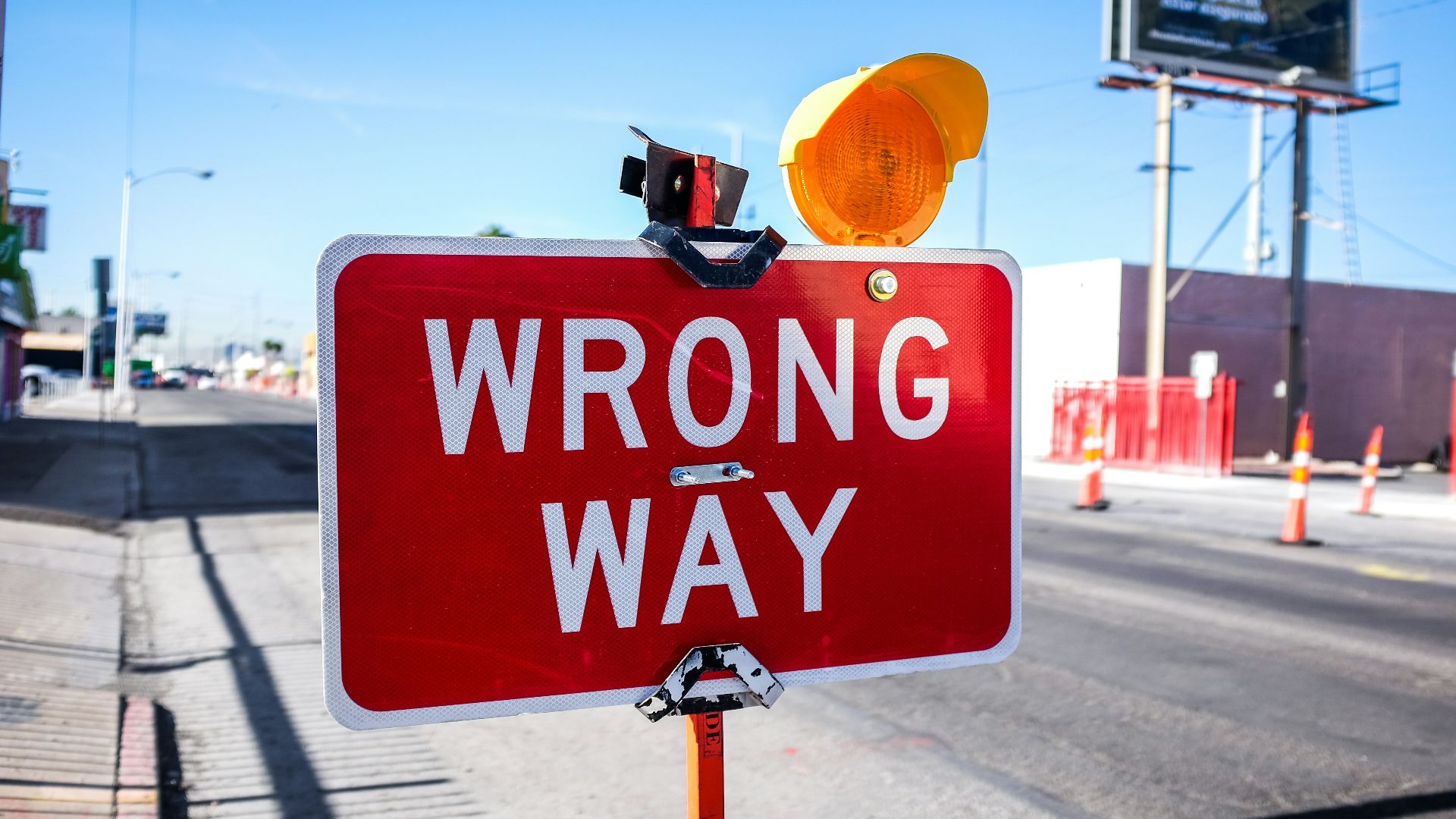 red Wrong Way signage on road