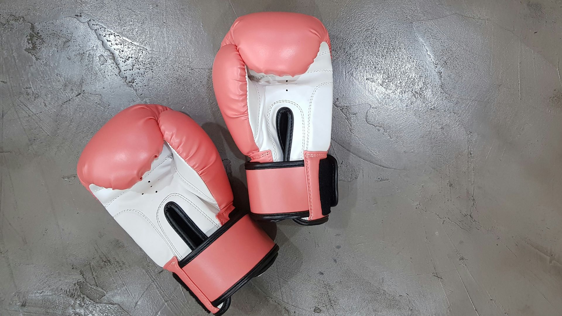 pair of pink boxing gloves