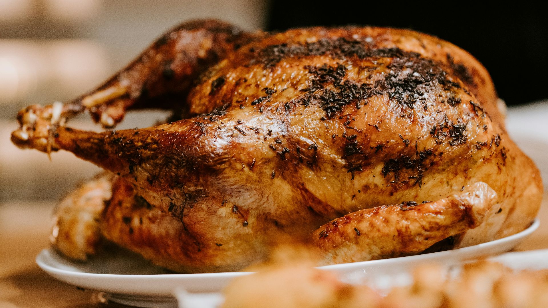 roasted chicken on white ceramic plate