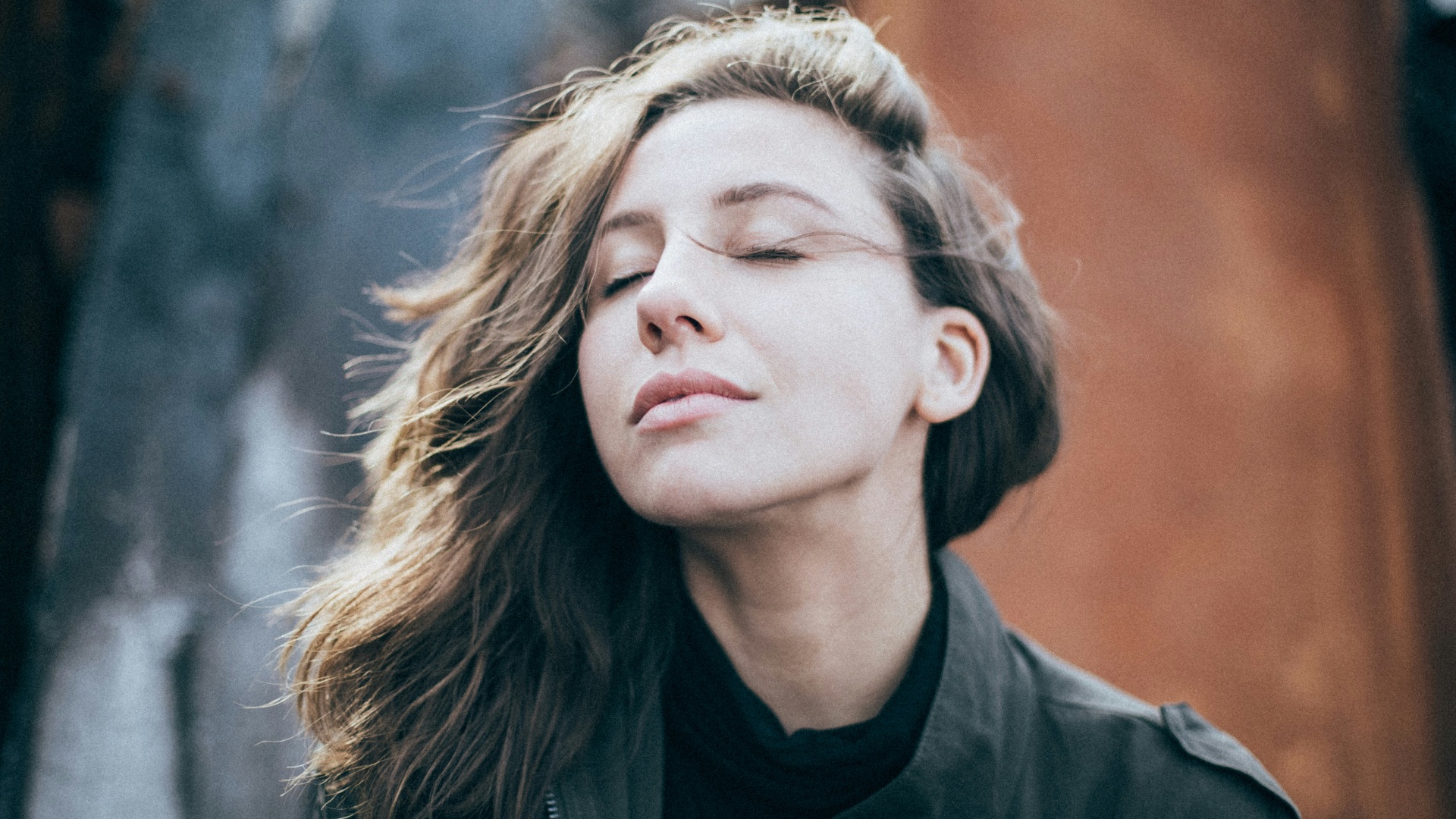 closeup photo of woman wearing black top