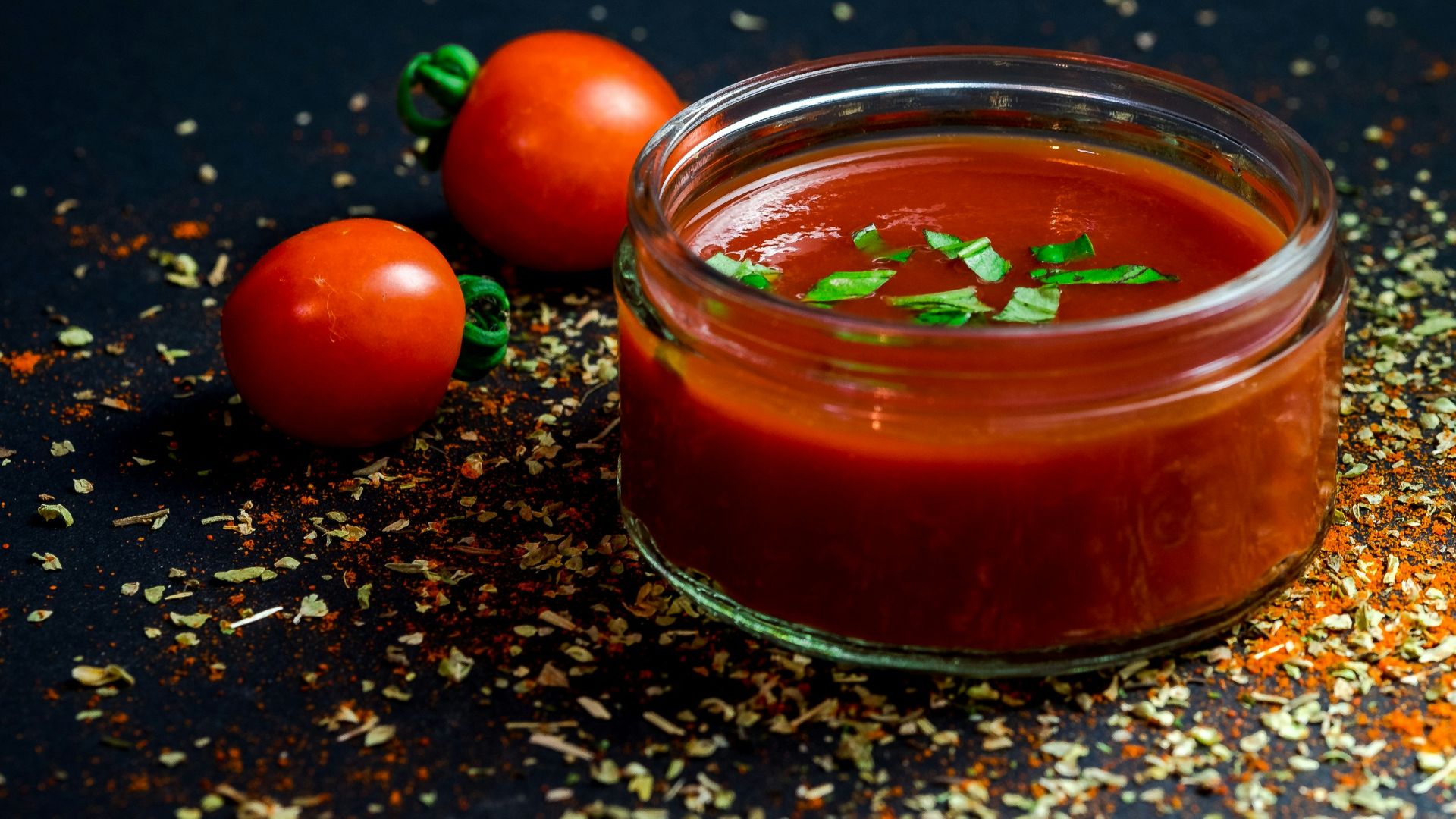 tomato and tomato puree with parsley in bowl
