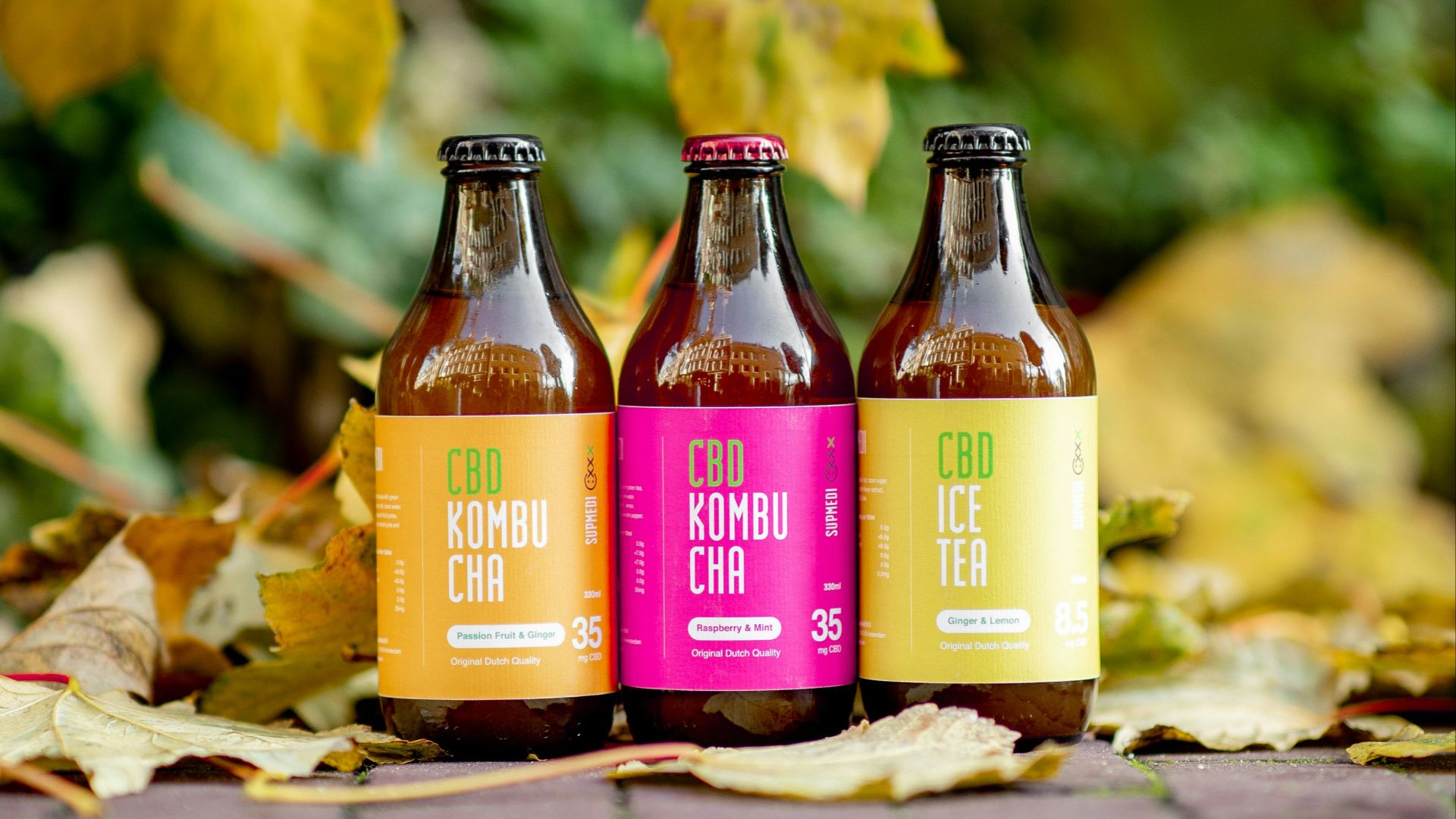 three amber glass bottles