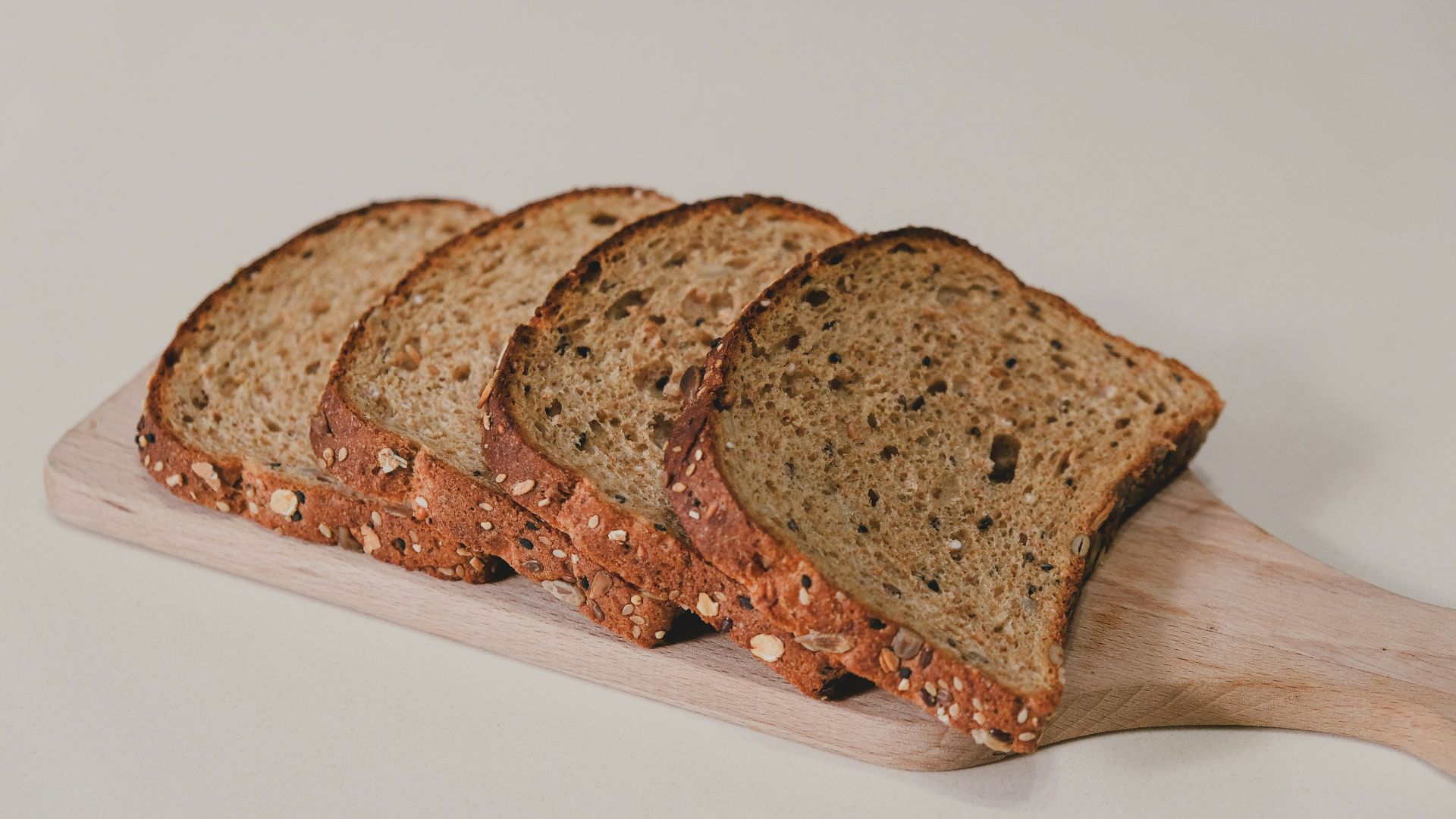 sliced bread on white table
