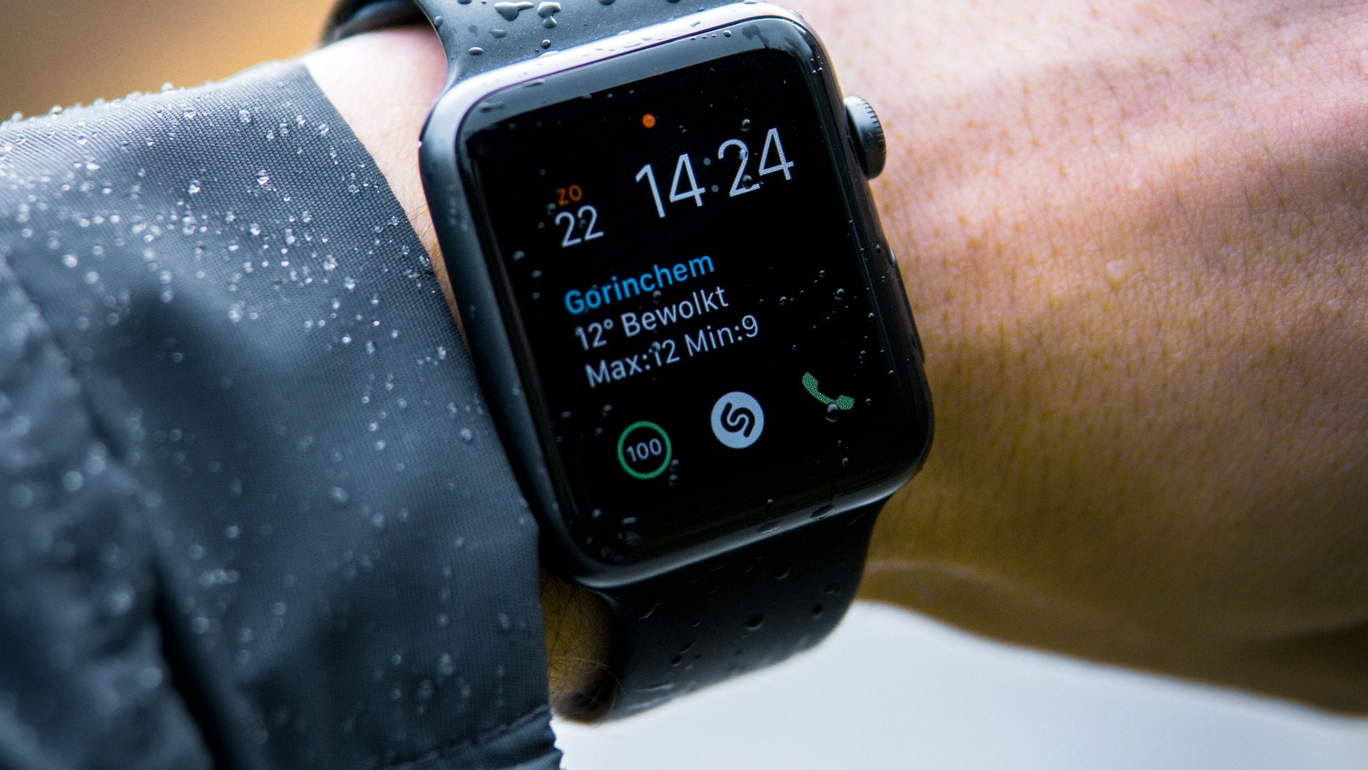 person wearing Apple Watch at 14:24