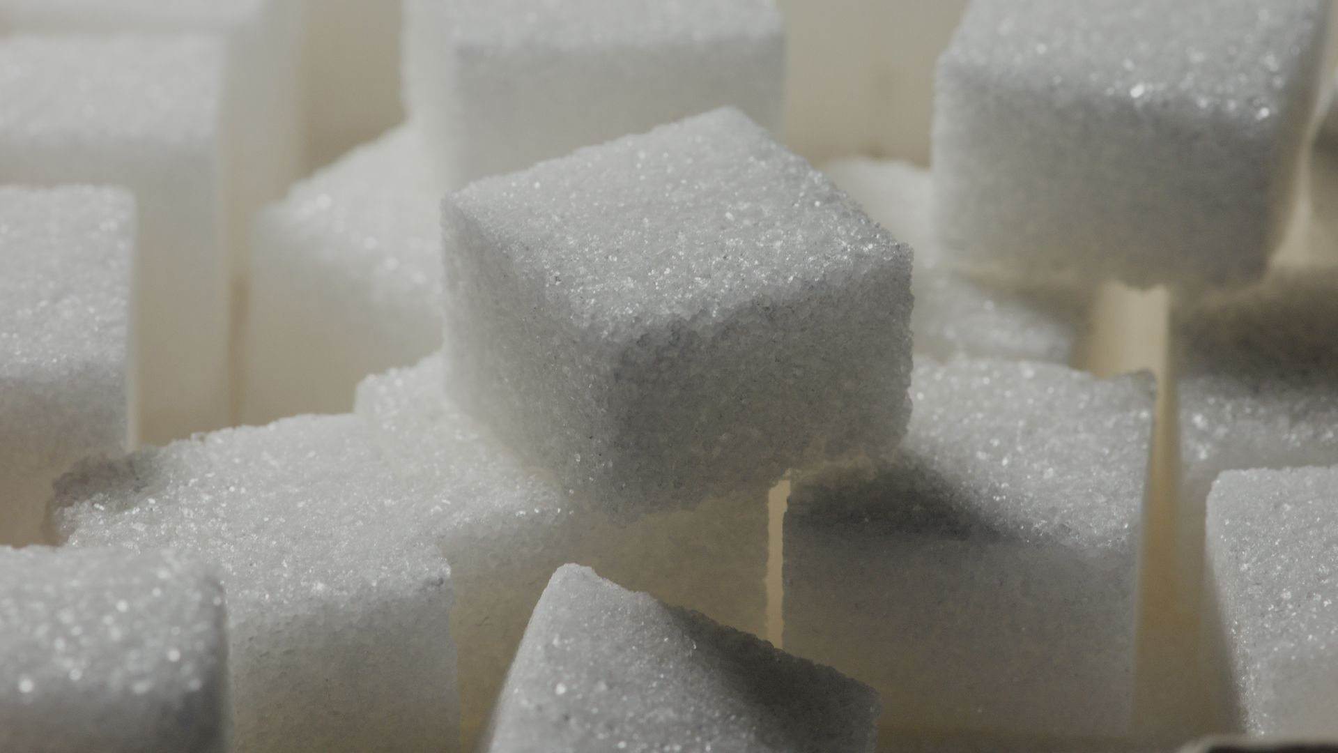 a pile of sugar cubes sitting on top of each other