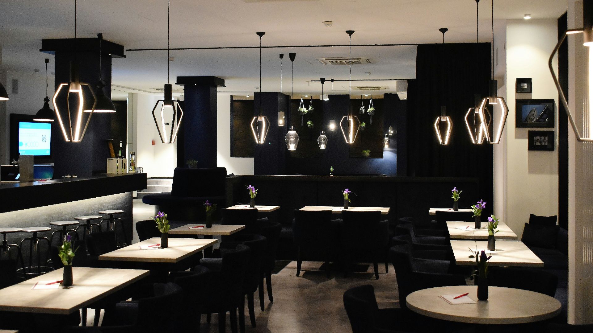 grey and brown wooden tables inside room