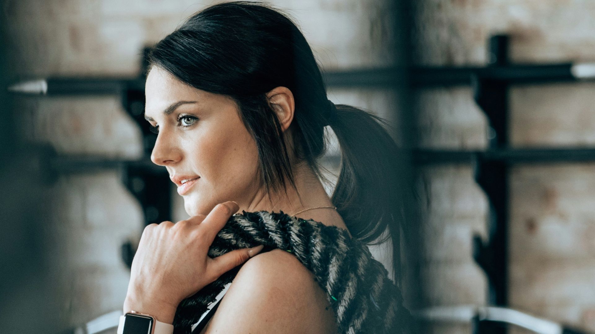 woman holding black rope