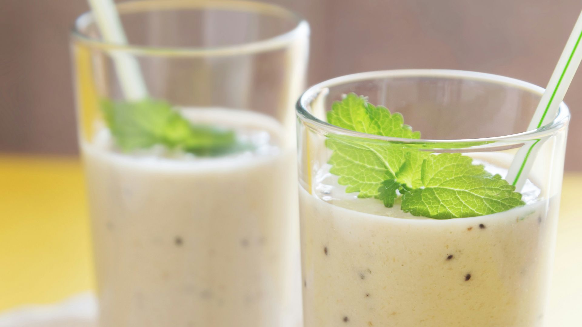 a couple of glasses of food on a table