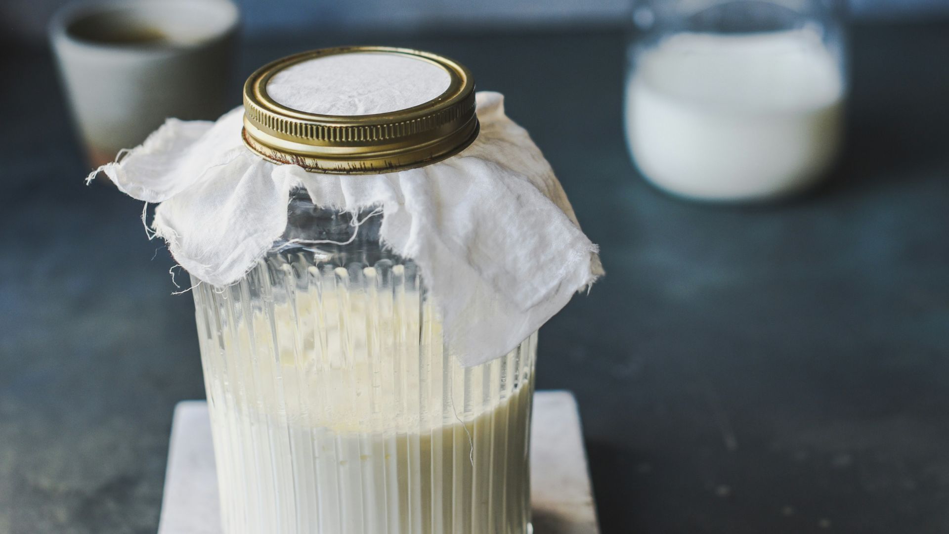 clear glass jar with white liquid