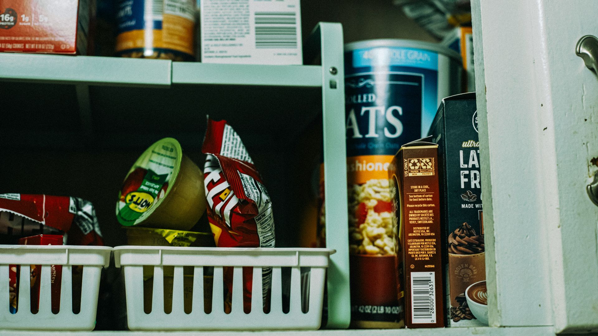 a shelf filled with lots of different types of food