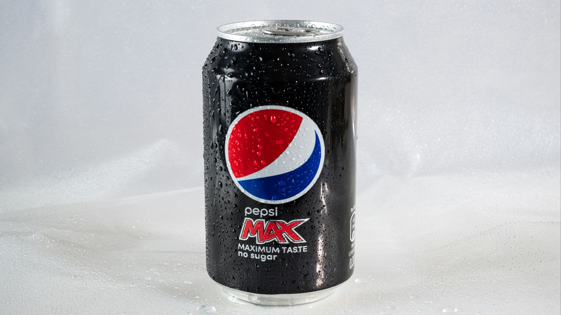 a black can of soda